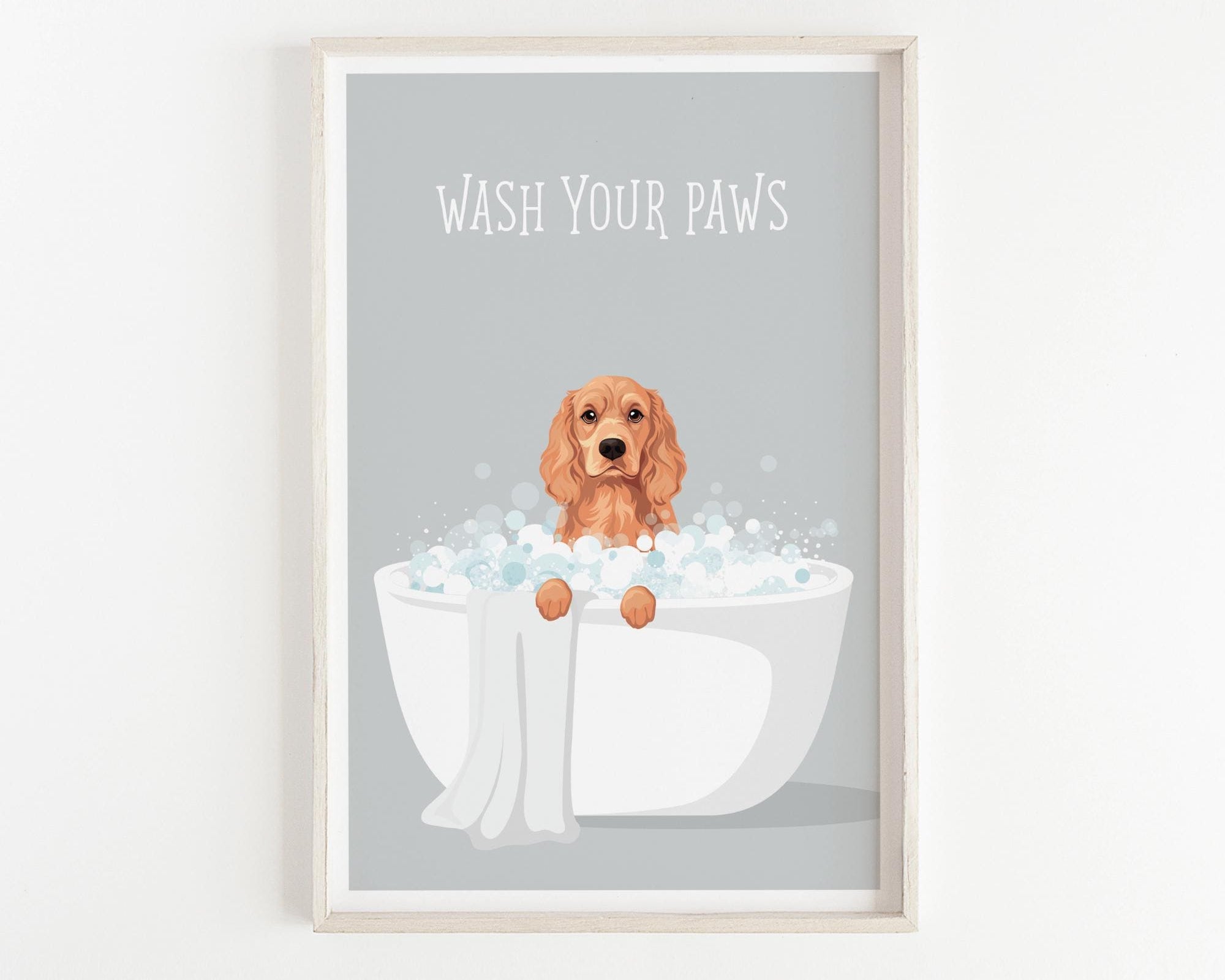 A framed illustration of a dog sitting in a bathtub filled with bubbles, with the text "WASH YOUR PAWS" displayed above it.