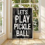 a black and white sign that says let's play pickle ball