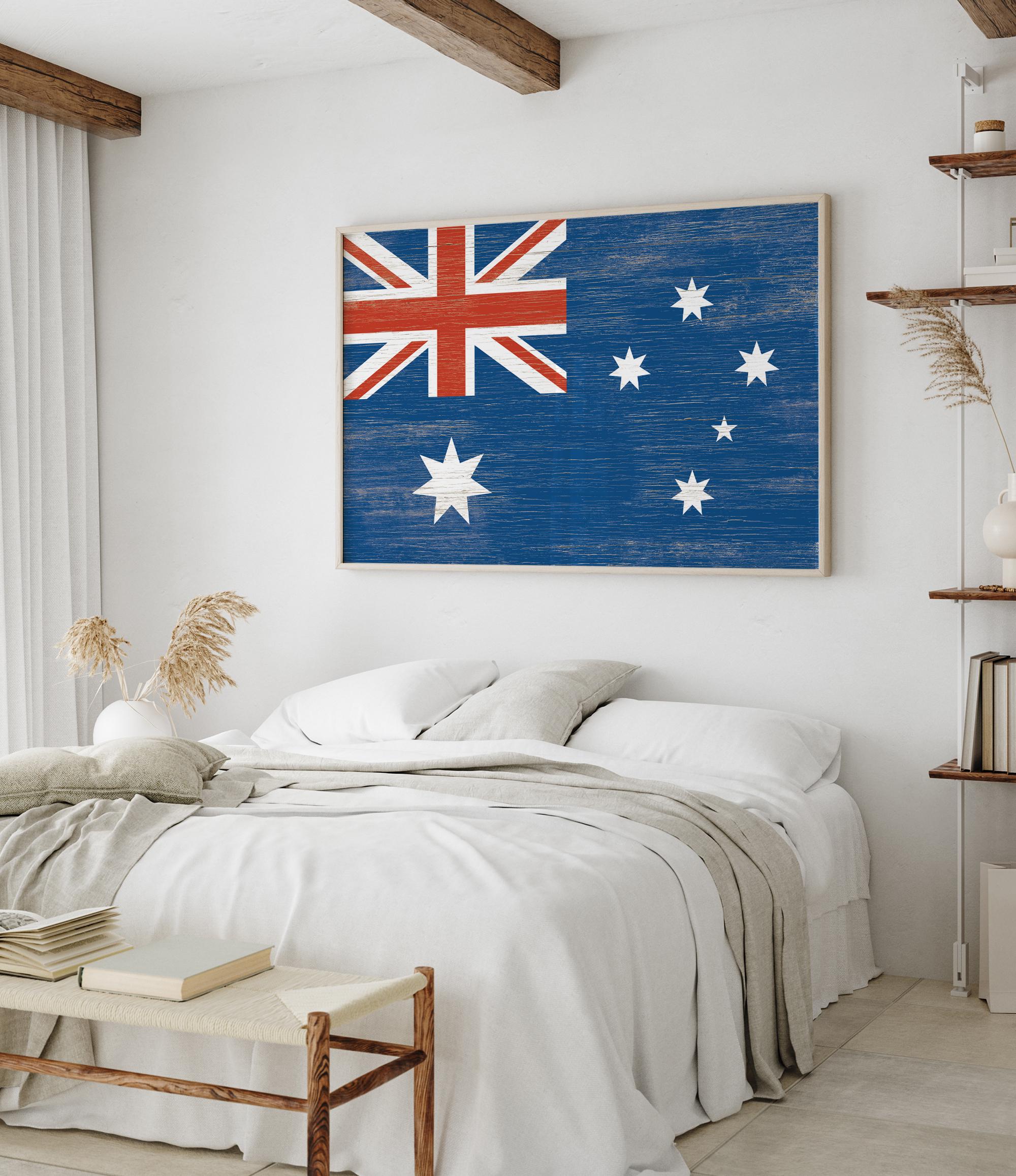 a bedroom with a bed and a painting on the wall