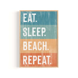 a wooden sign that says eat sleep beach repeat