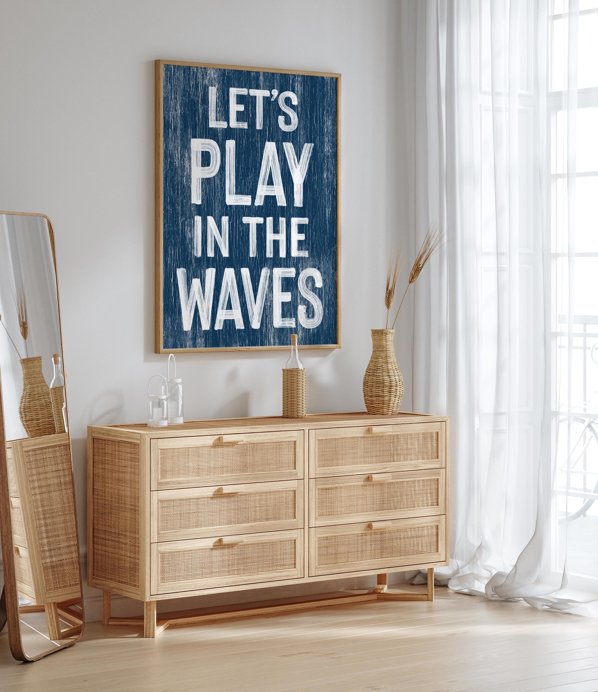 a picture of a room with a dresser and a mirror