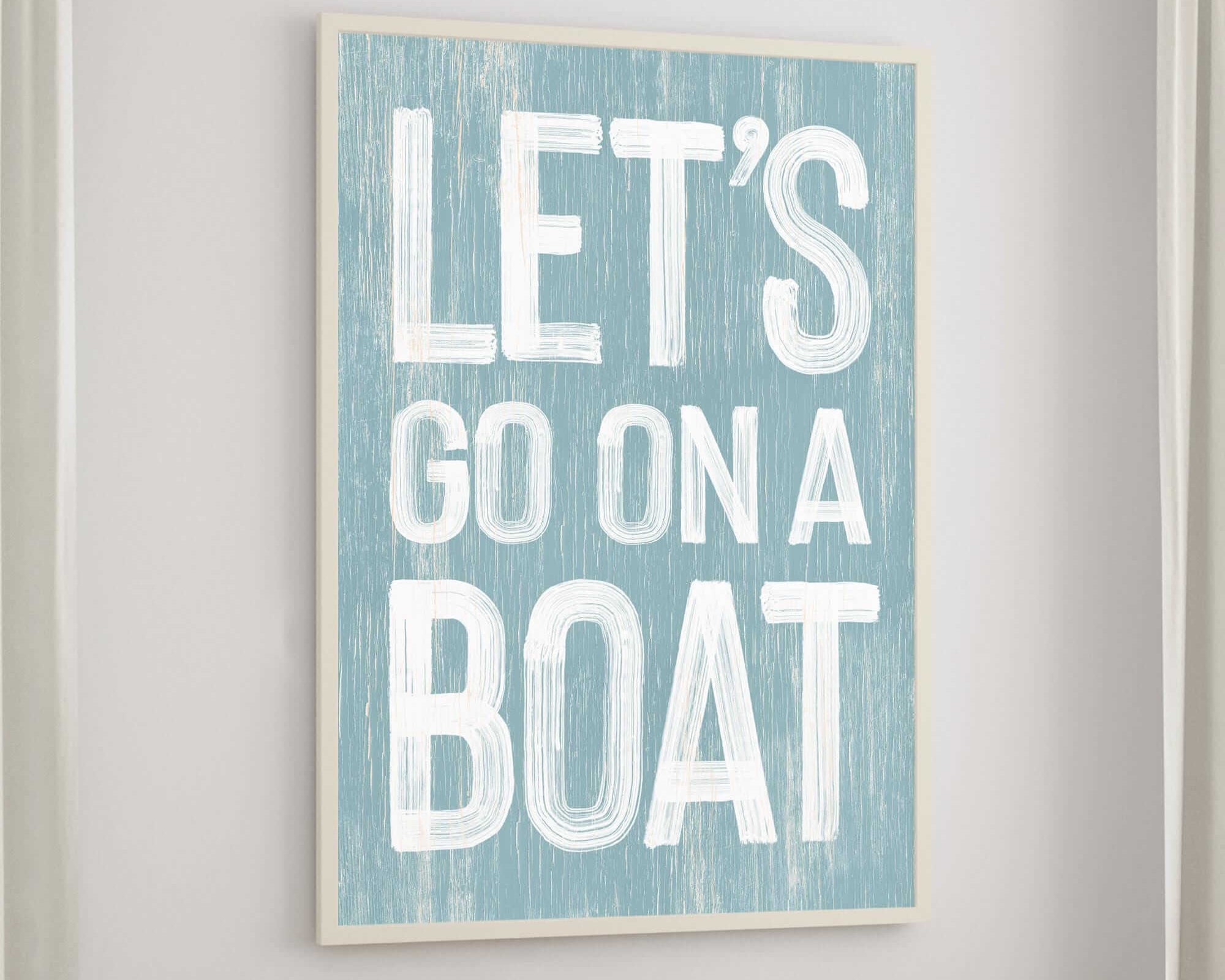 a blue and white sign that says let's go on a boat