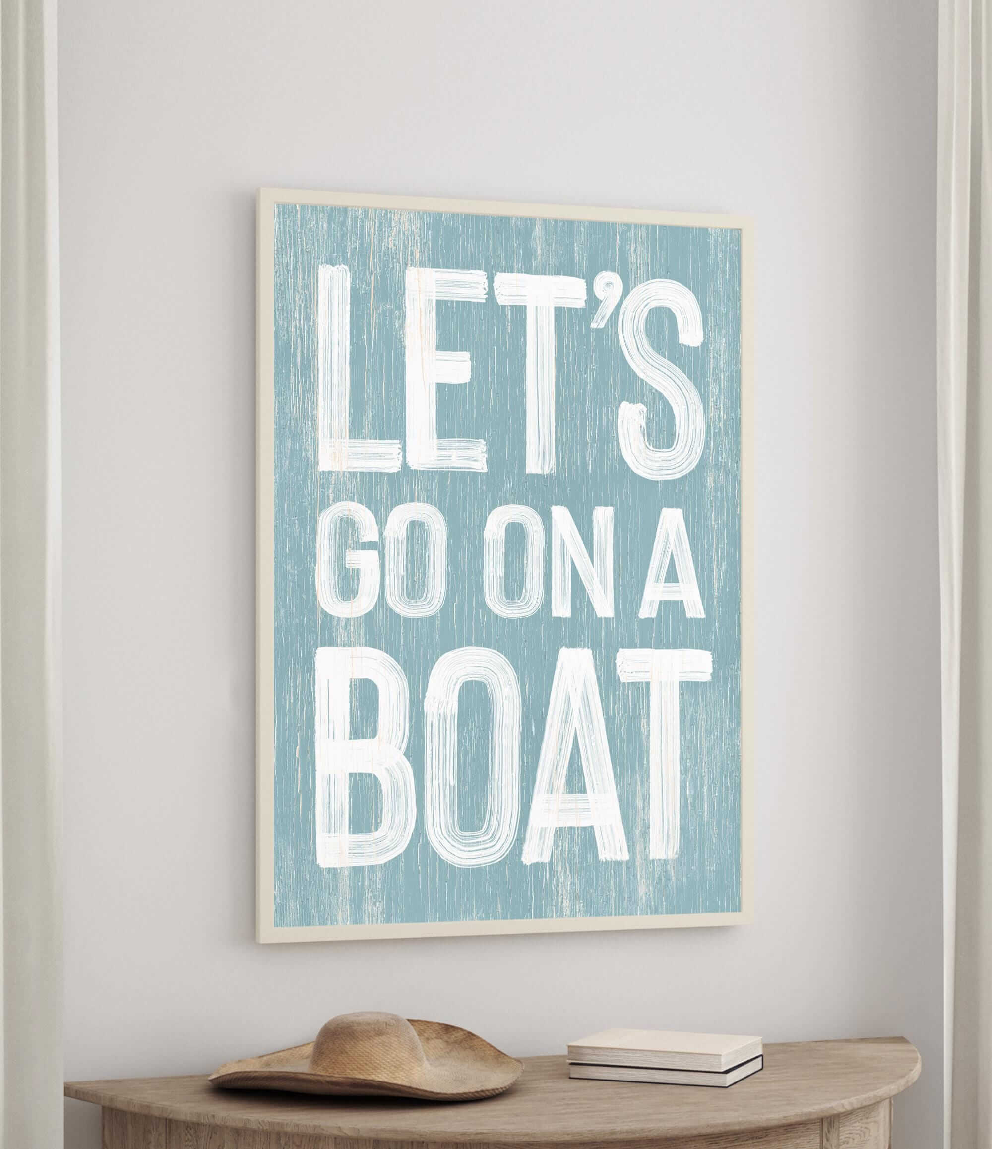 a blue and white sign that says let&#39;s go on a boat