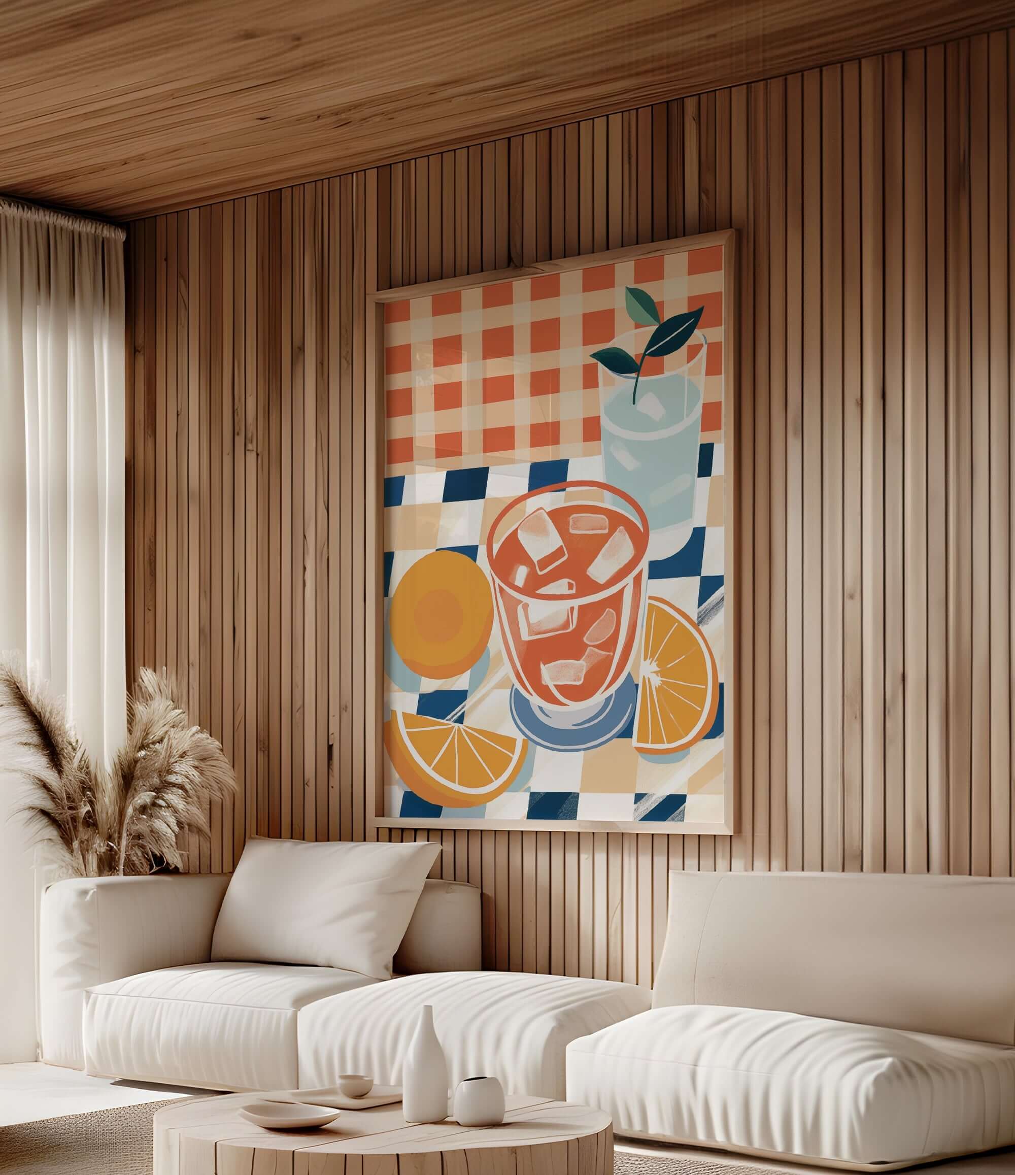 a cozy living room with a large, colorful painting of a drink on the wall, featuring a glass, orange slices, and a potted plant. The room has a wooden wall and a white sofa, creating a warm and inviting atmosphere.