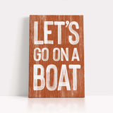 a wooden sign that says let&#39;s go on a boat