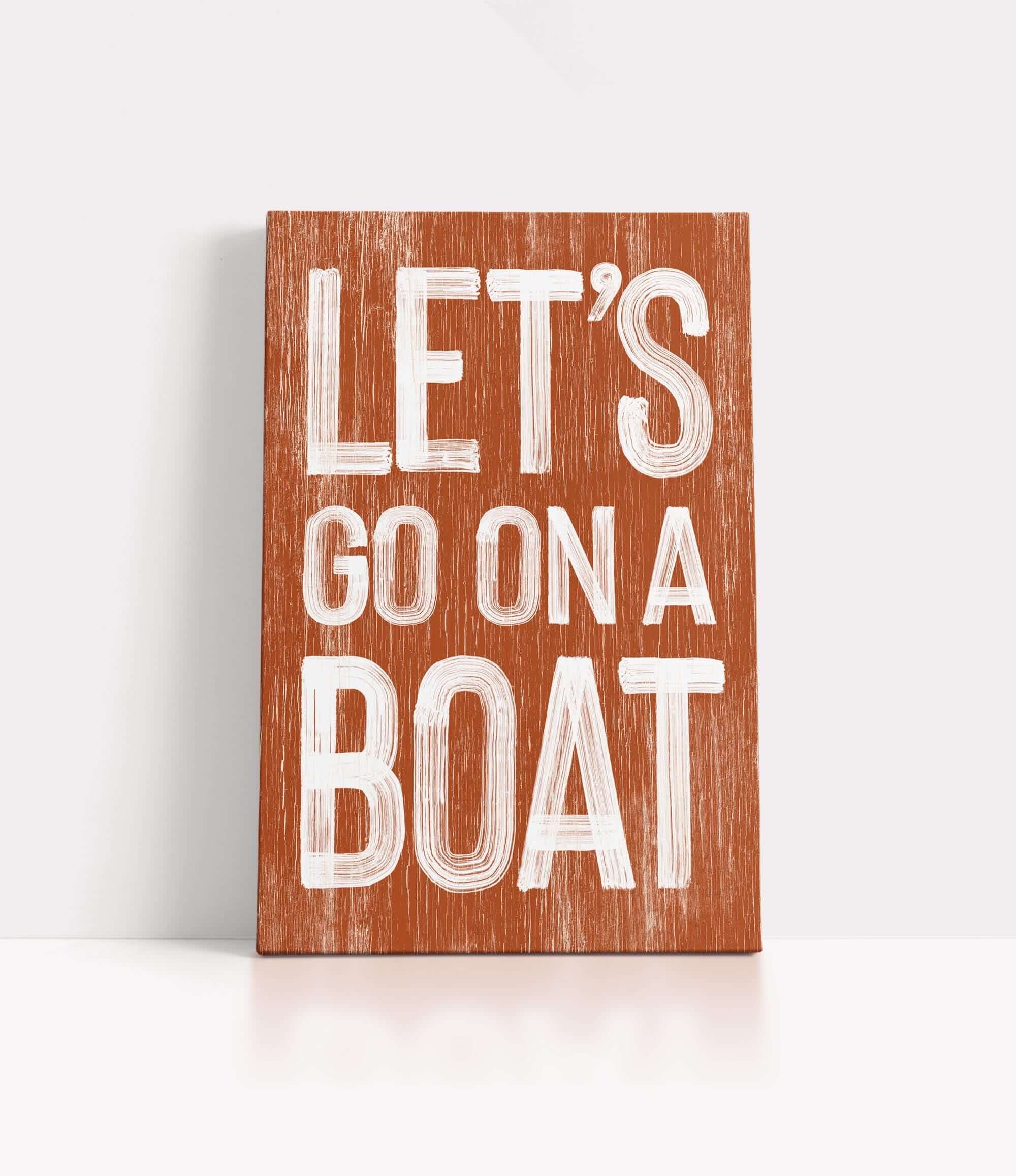 a wooden sign that says let&#39;s go on a boat