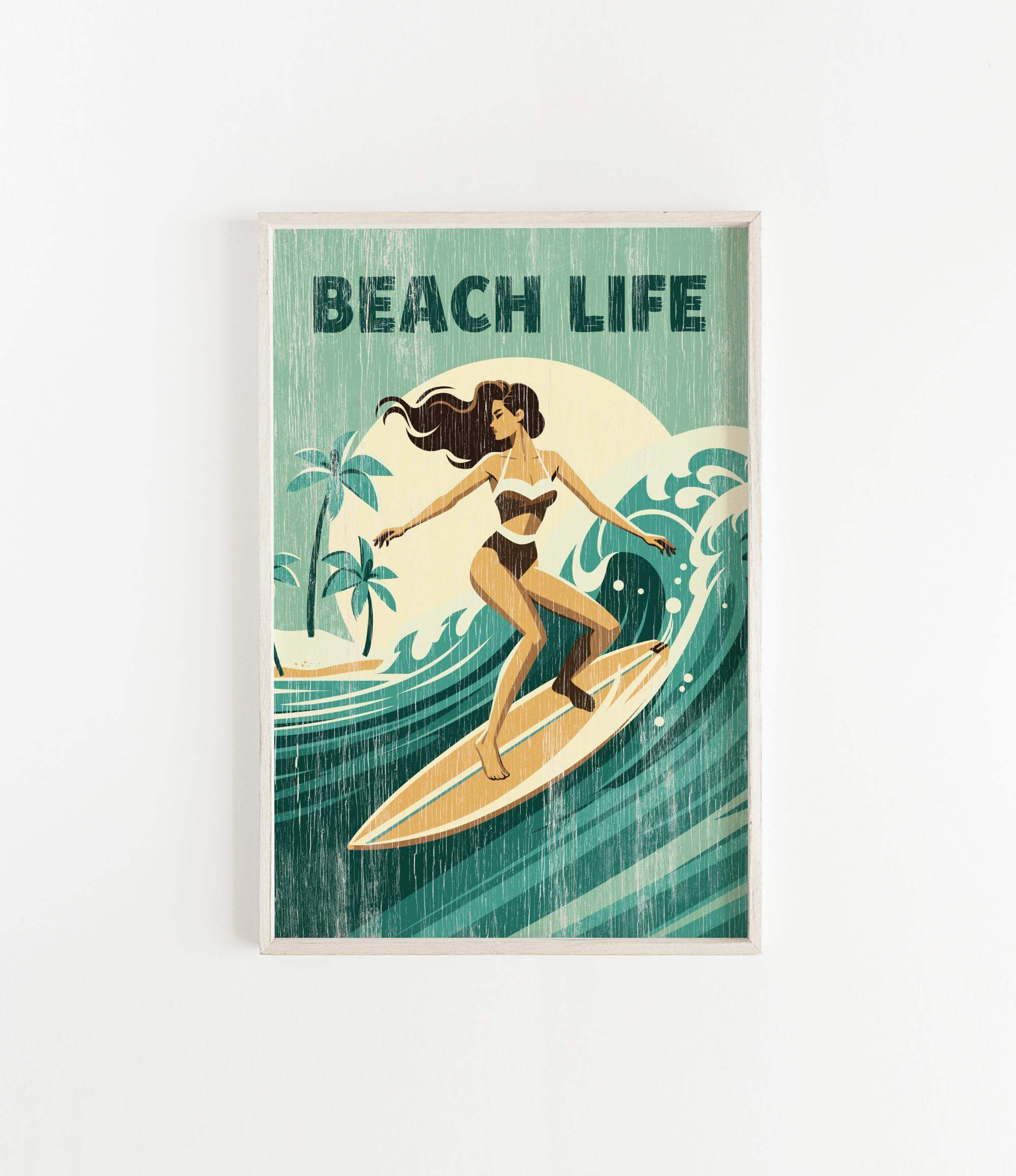 A framed poster depicting a woman surfing on a wave, with the text "BEACH LIFE" prominently displayed.