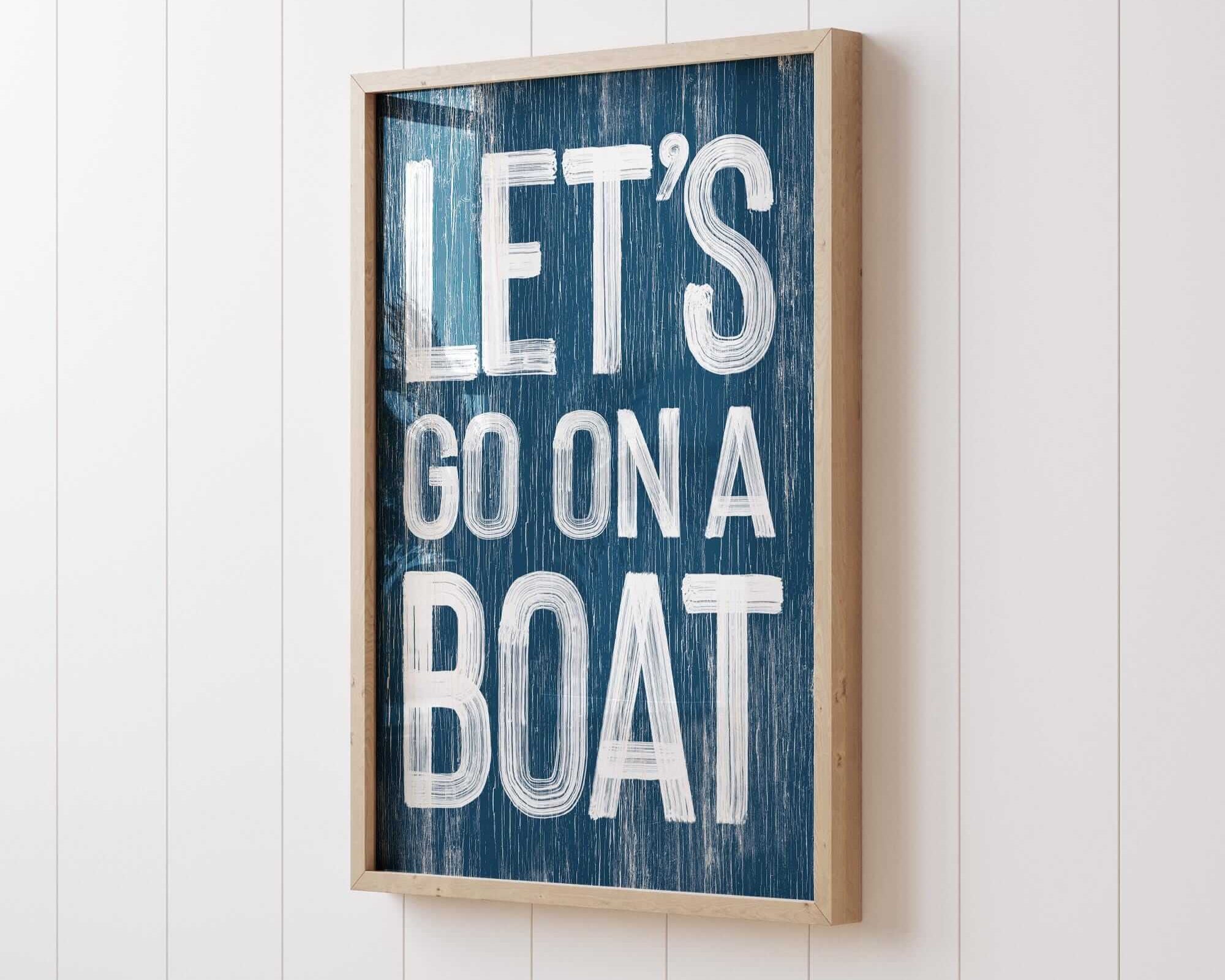 a wooden sign that says let's go on a boat