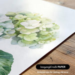 a close-up view of a watercolor painting of a cluster of white hydrangea flowers on a white background.