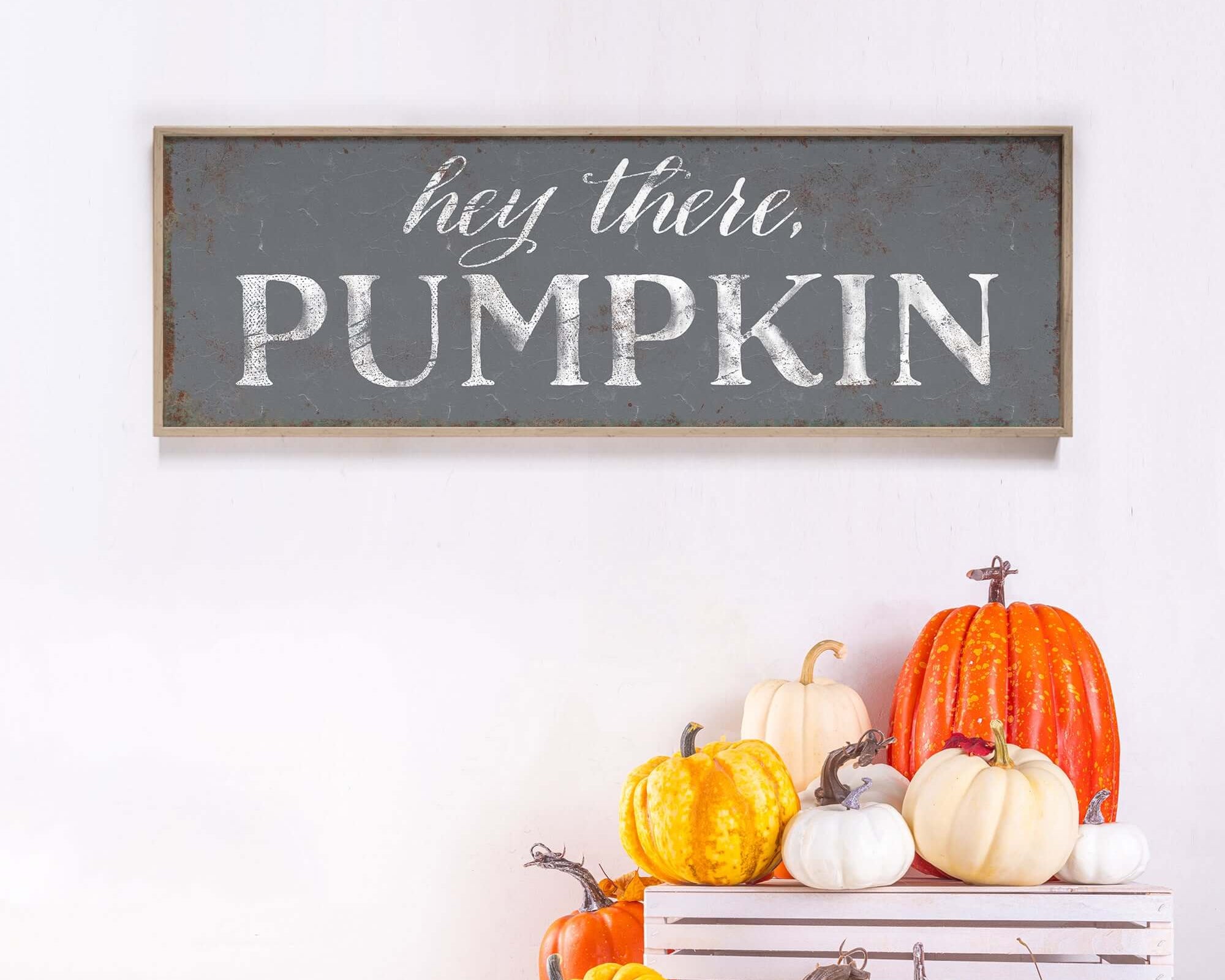 a sign that says hey there is a pumpkin