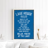 a framed sign with a list of rules for a lake house, including activities such as wakeboarding, swimming, and napping.