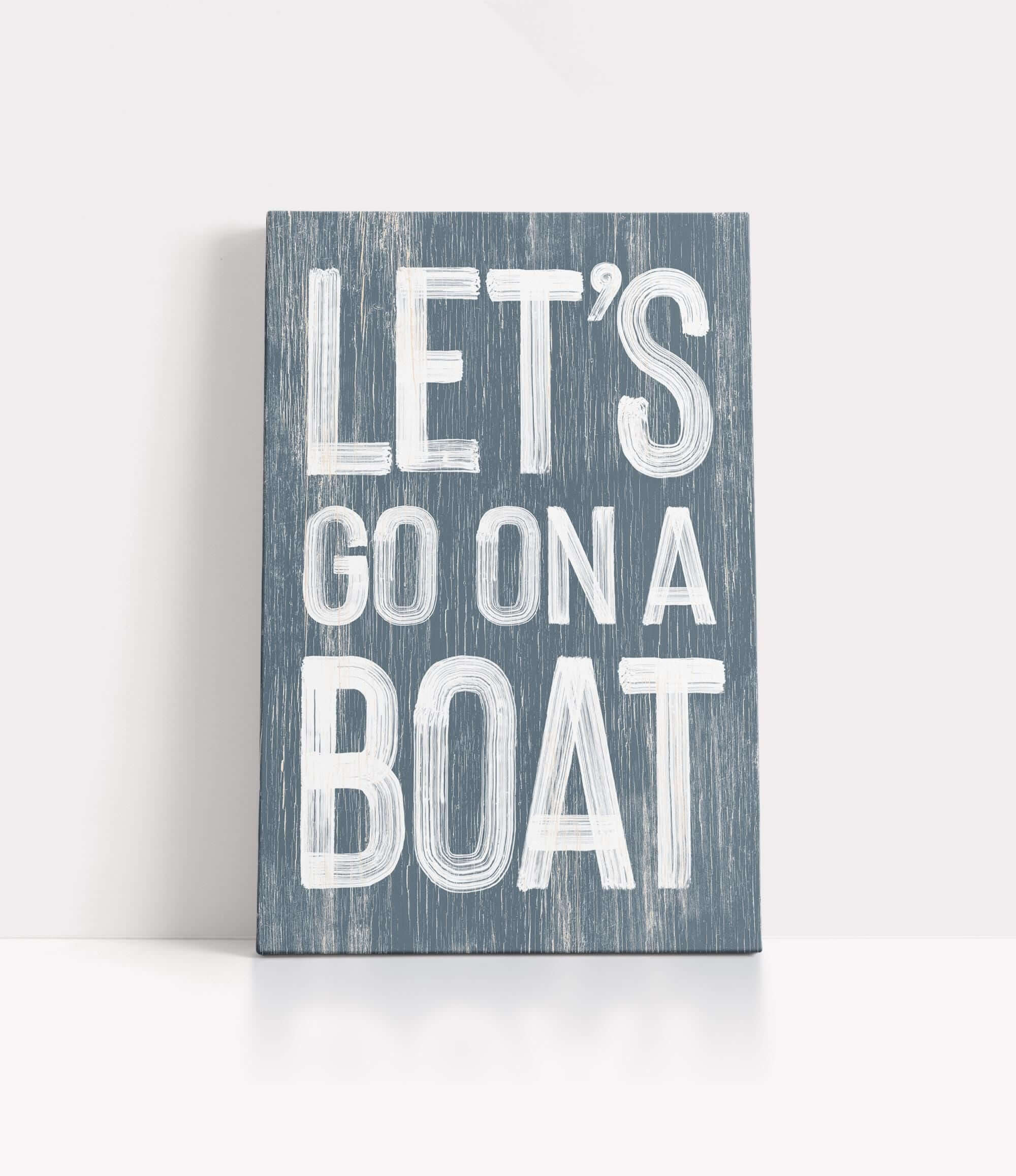 a wooden sign that says let&#39;s go on a boat