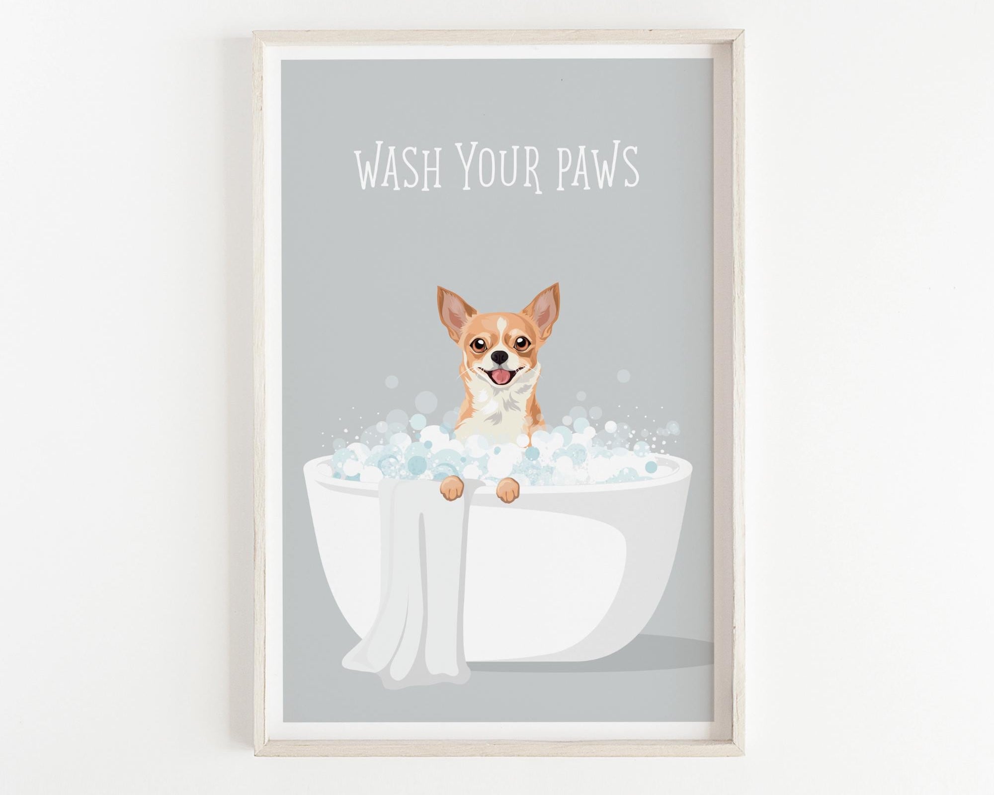 A framed poster with a cartoon image of a dog sitting in a bathtub filled with bubbles, with the text "WASH YOUR PAWS" written above it.