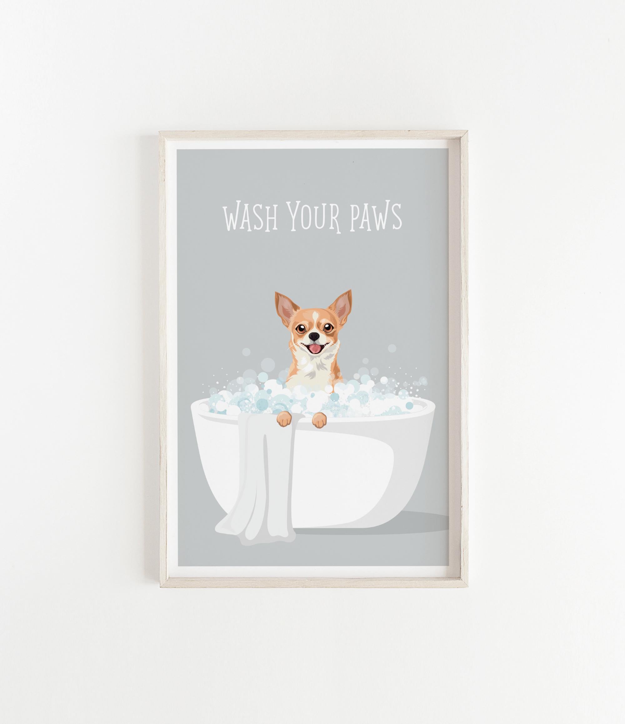 A framed poster with a cartoon image of a dog sitting in a bathtub filled with bubbles, with the text "WASH YOUR PAWS" written above it.