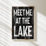 a sign that says meet me at the lake