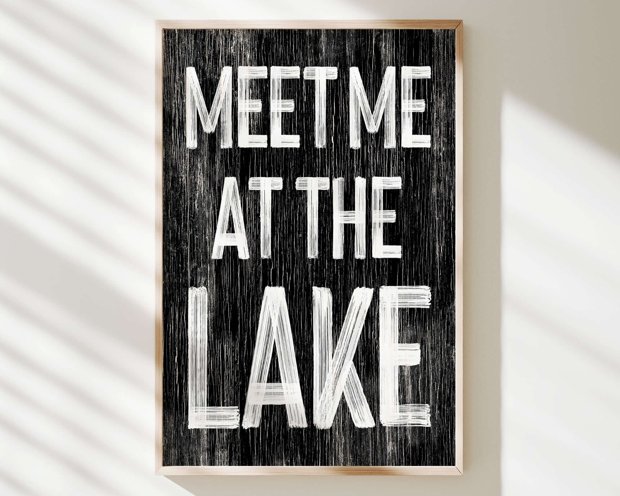 a sign that says meet me at the lake
