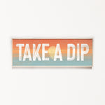 a wooden sign that says take a dip