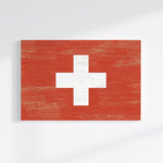 a Swiss flag, red with a white cross in the center.