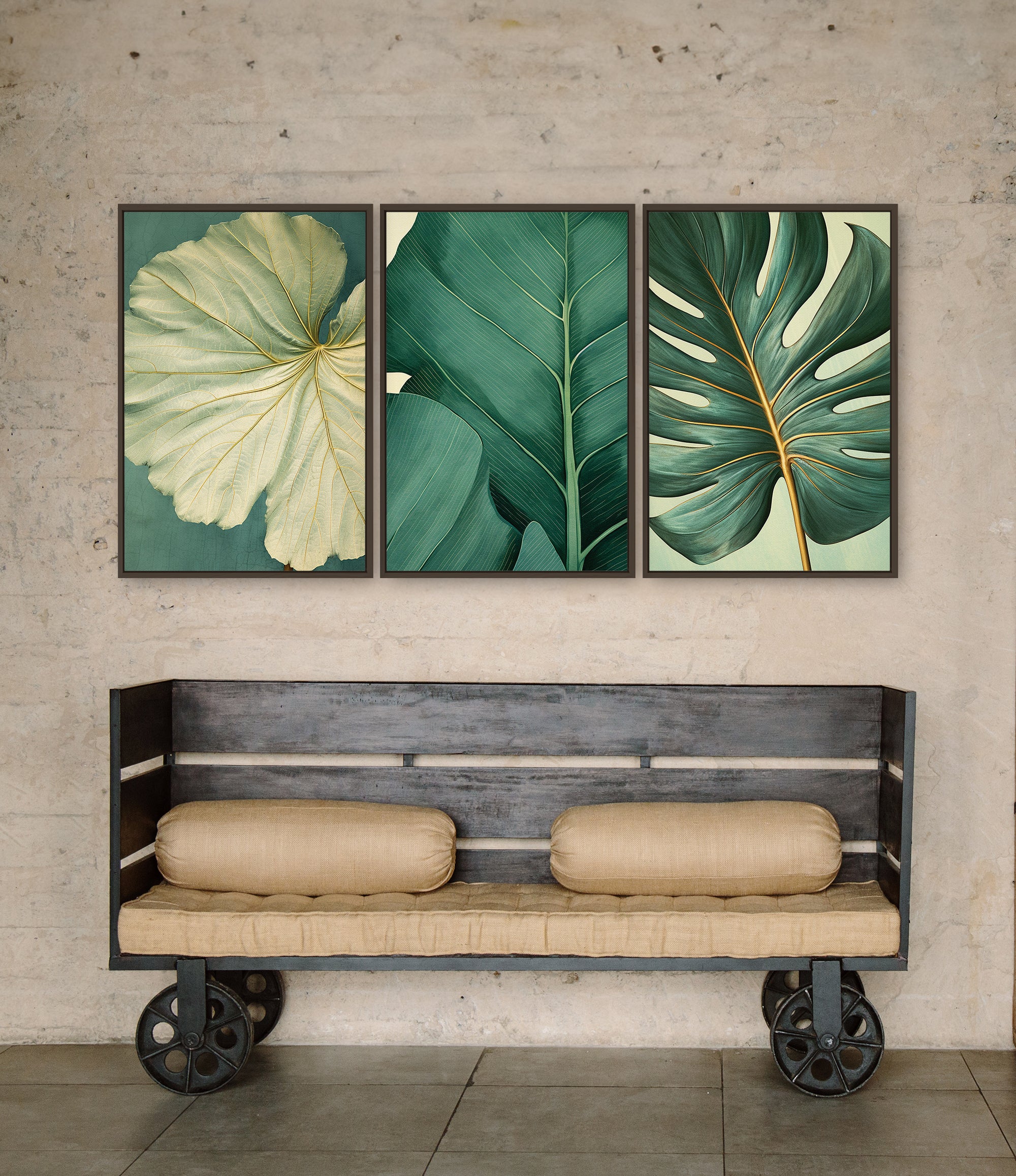 a wooden bench with two beige cushions, positioned in front of three framed botanical prints on a wall.