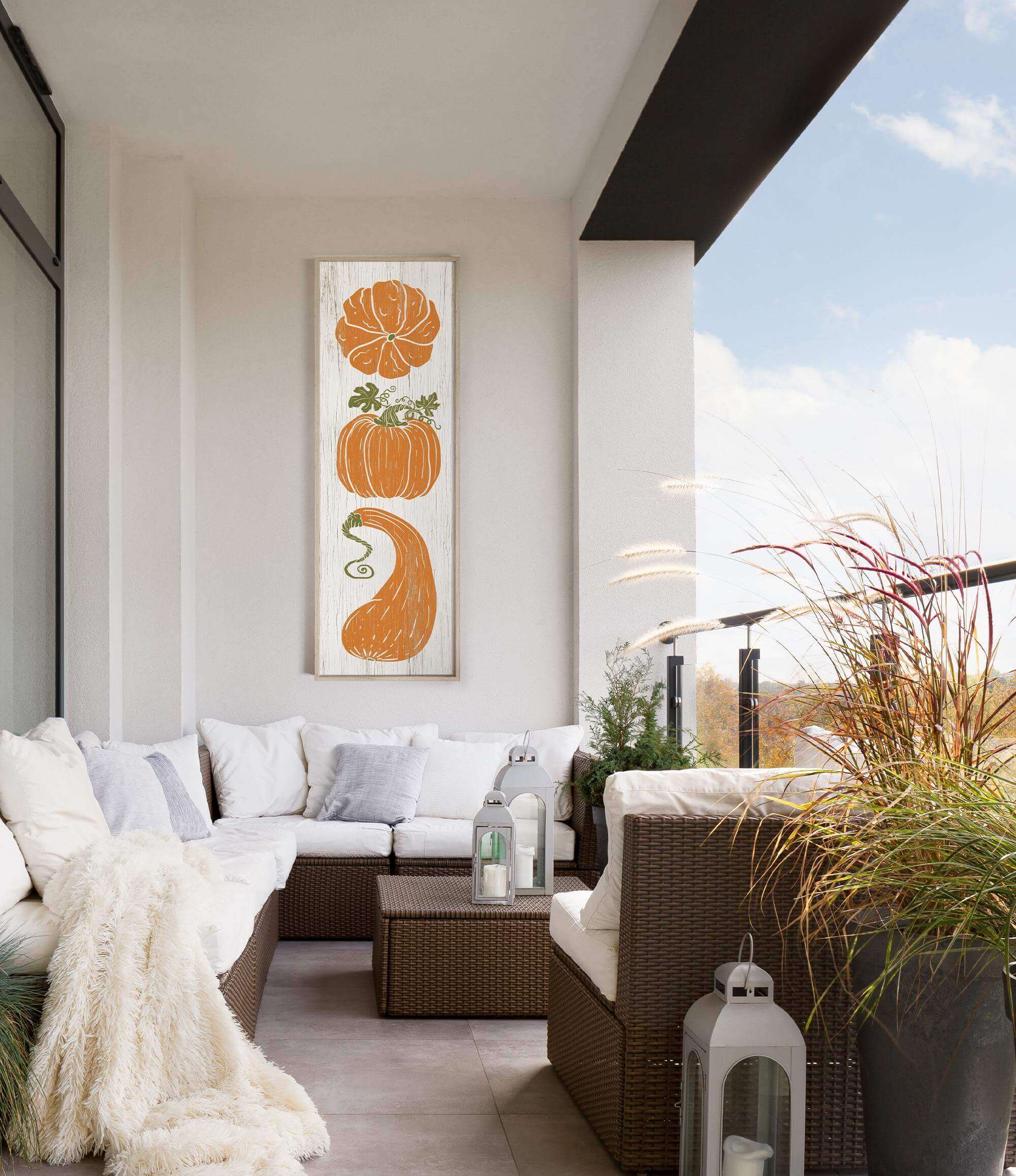 a white couch sitting on top of a wooden floor