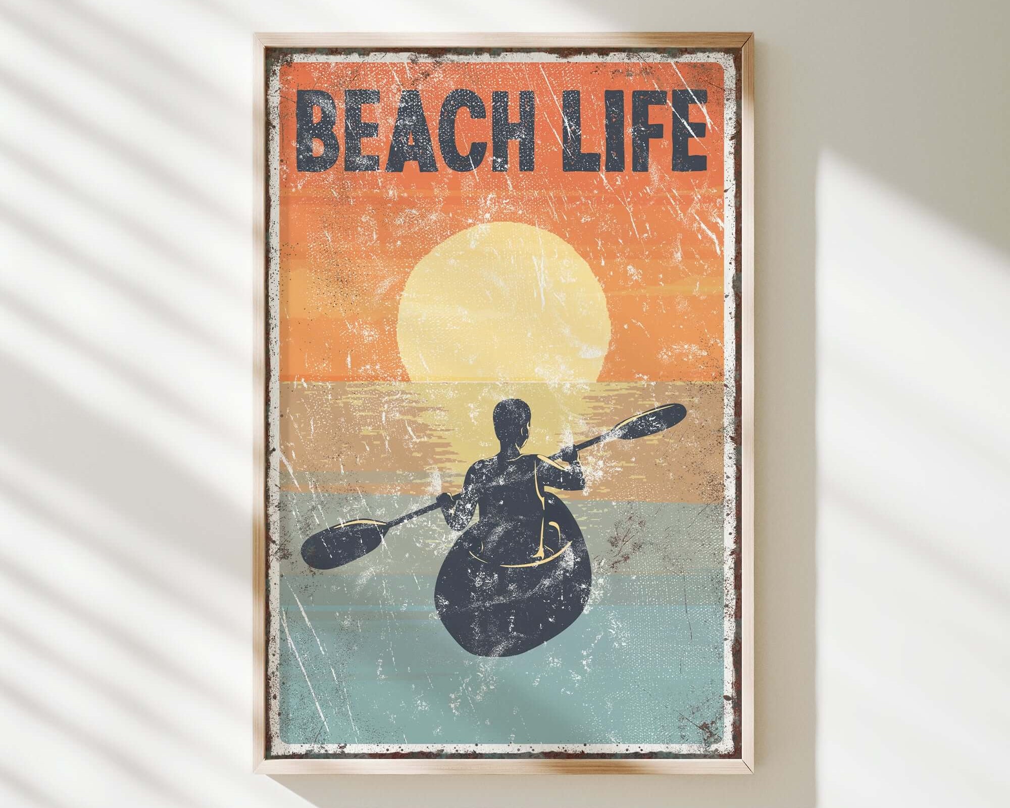 a picture of a person in a kayak on the beach