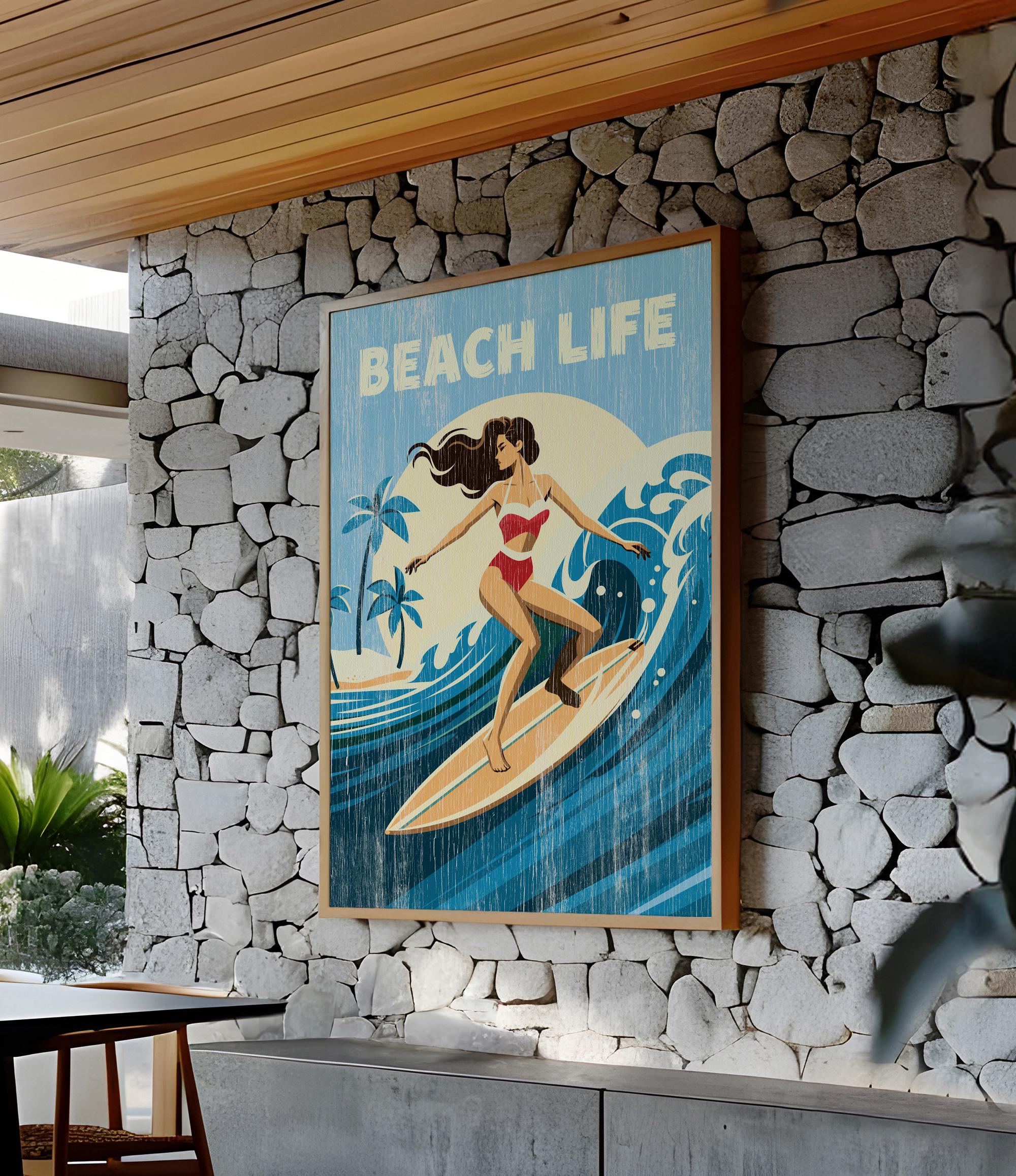 a framed "Beach Life" poster of a woman surfing on a wave, mounted on a stone wall.