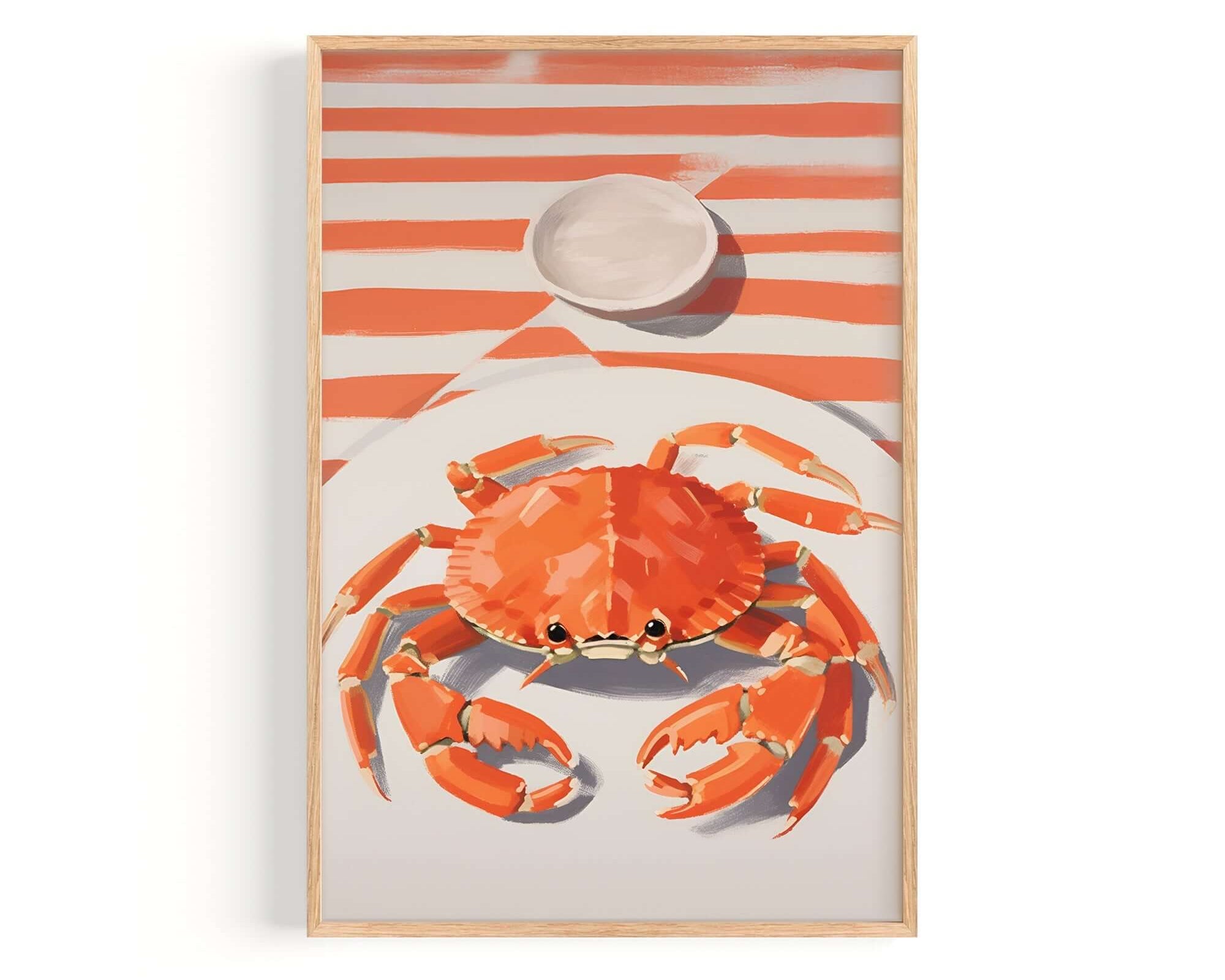 a large orange crab with its claws spread out, sitting on a white plate against a striped background.