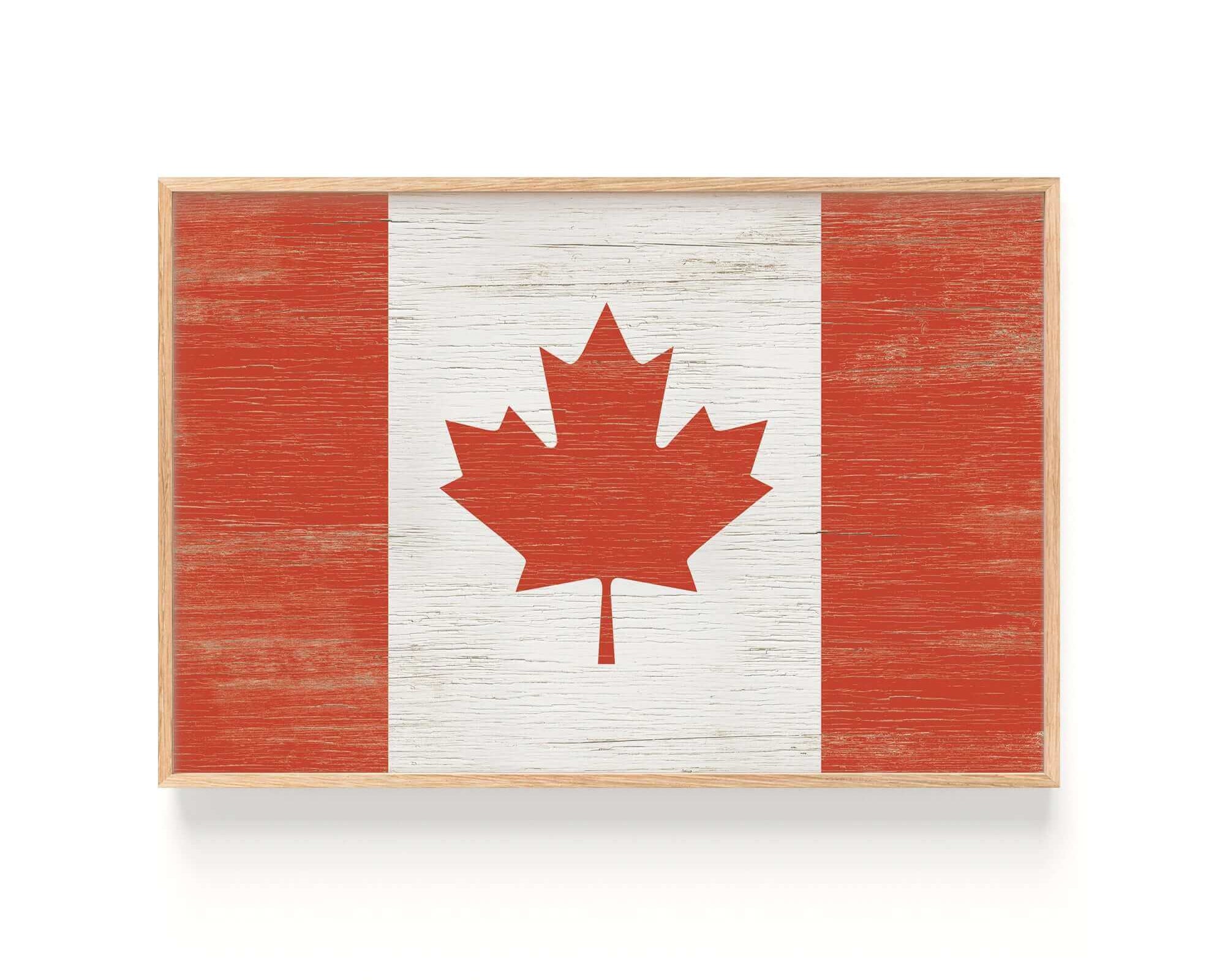 a wooden sign with a canadian flag painted on it
