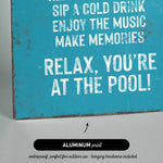 a blue sign that says relax you&#39;re at the pool