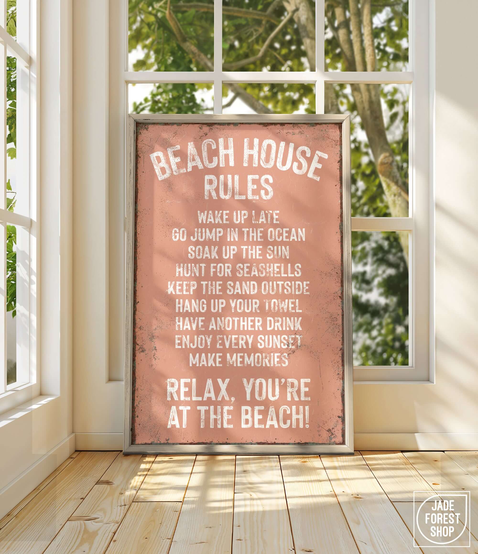 a sign on a window sill that says beach house rules