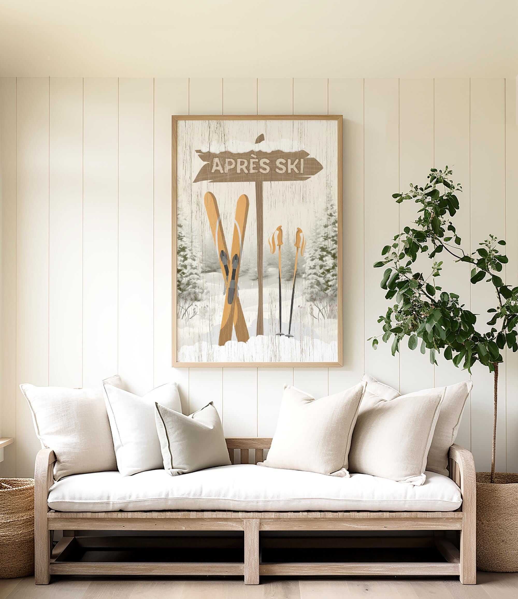 a cozy living room with a large framed picture of skis hanging on the wall above a white sofa with pillows.