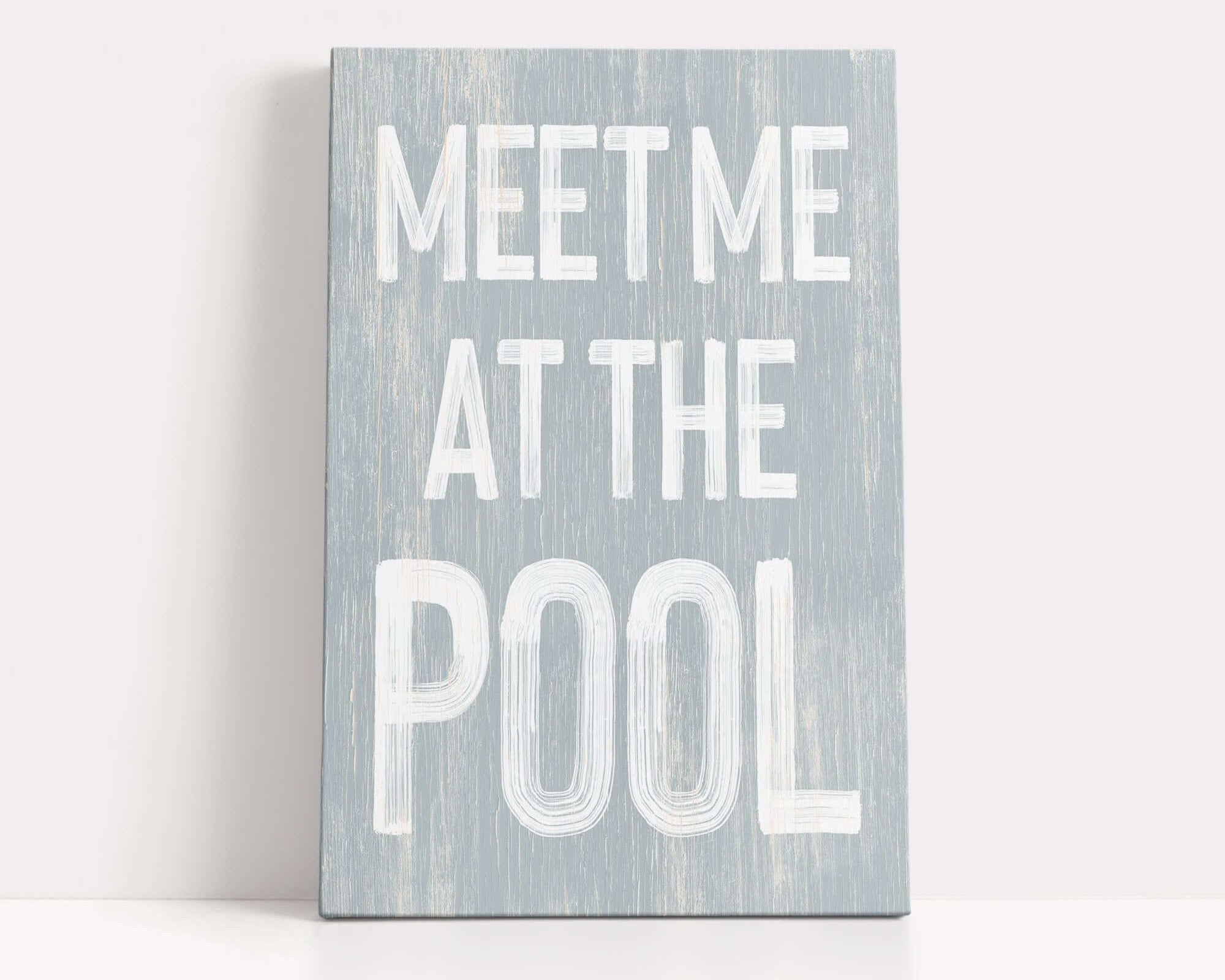 a wooden sign that says meet me at the pool