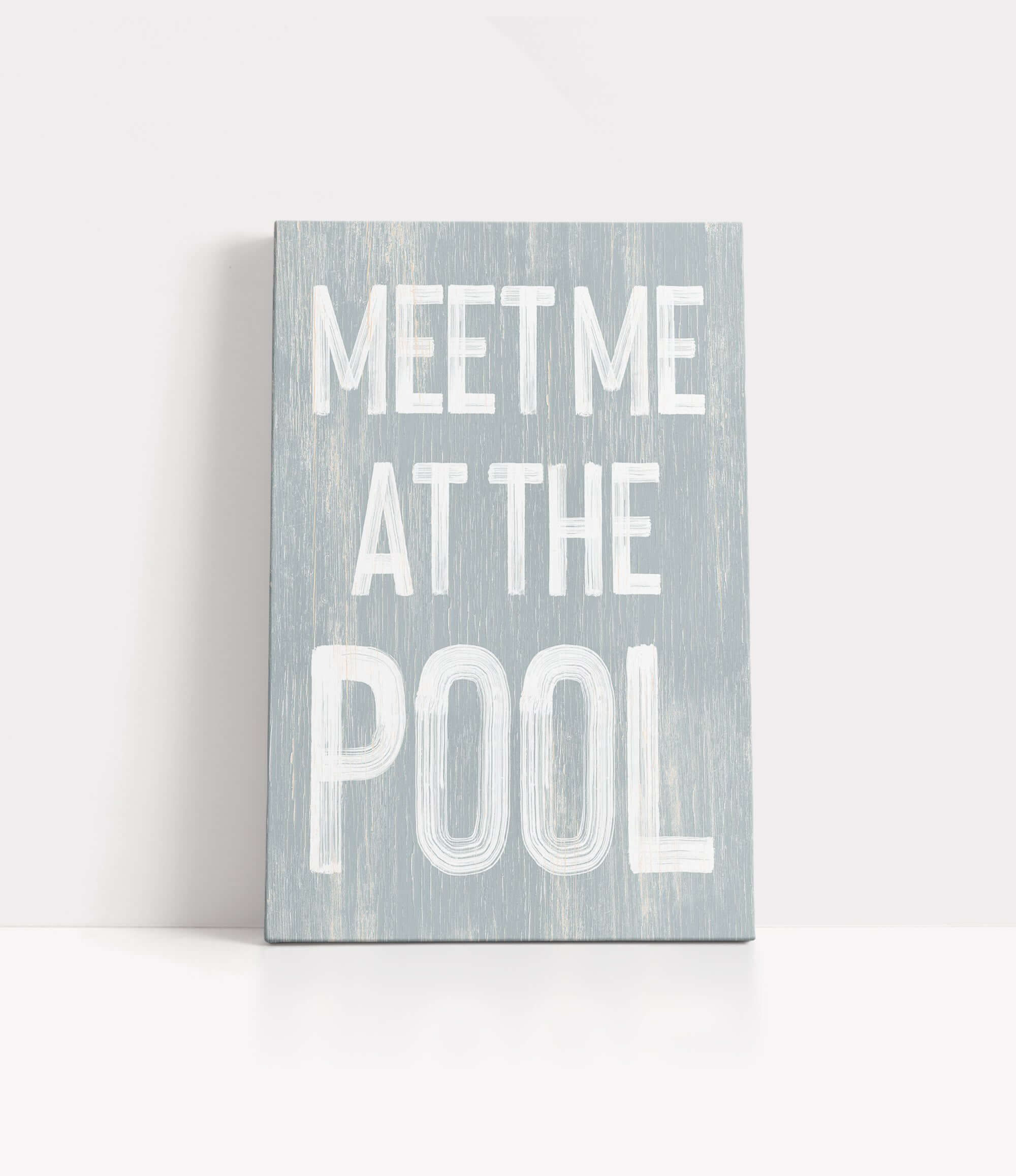 a wooden sign that says meet me at the pool