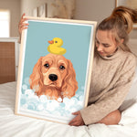 A woman is sitting on a bed holding a framed picture of a dog with a yellow rubber duck on its head.