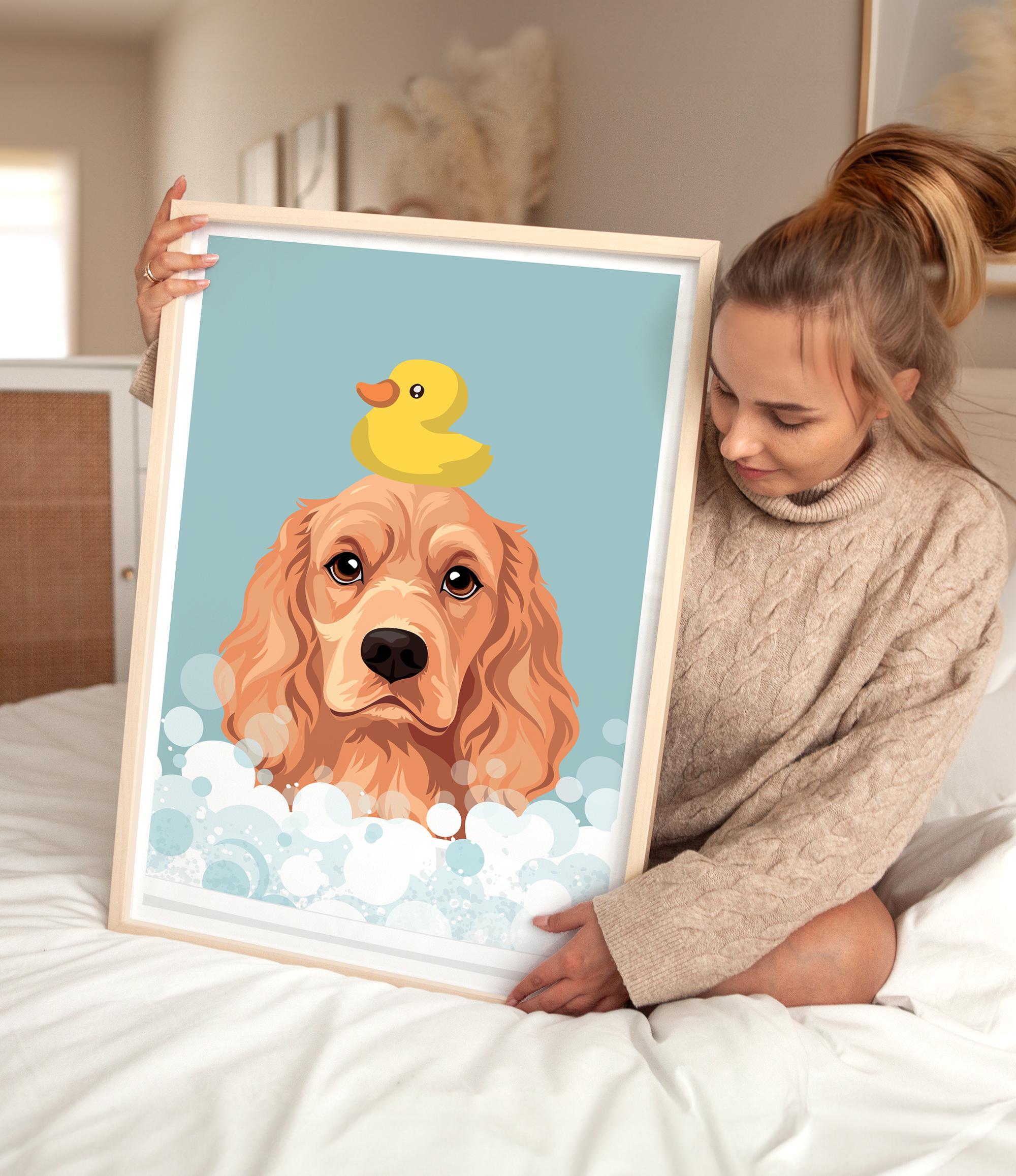 A woman is sitting on a bed holding a framed picture of a dog with a yellow rubber duck on its head.