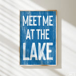 a blue sign that says meet me at the lake