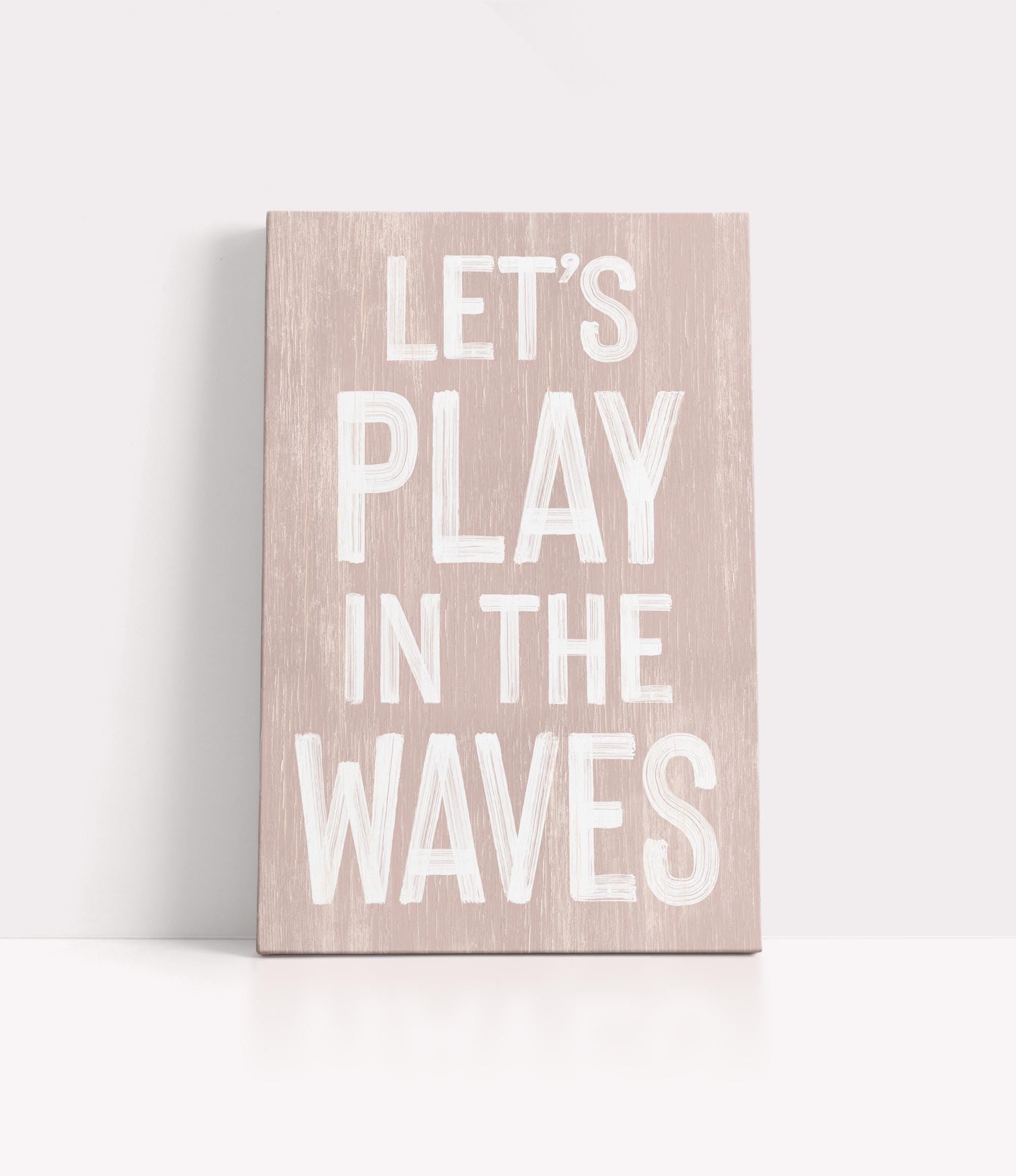 a wooden sign that says let&#39;s play in the waves