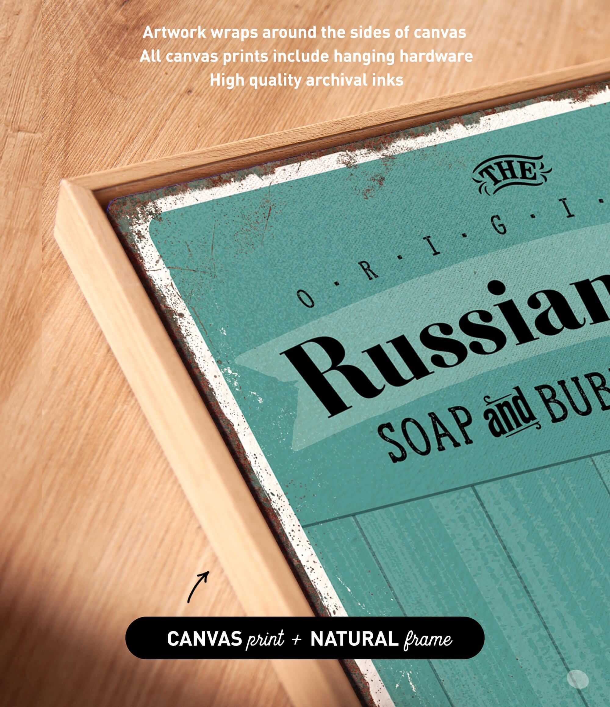 a close-up of a canvas print with the text "Russian SOAP and BUB" printed on it, along with some text indicating that the artwork wraps around the sides of the canvas and includes hanging hardware.