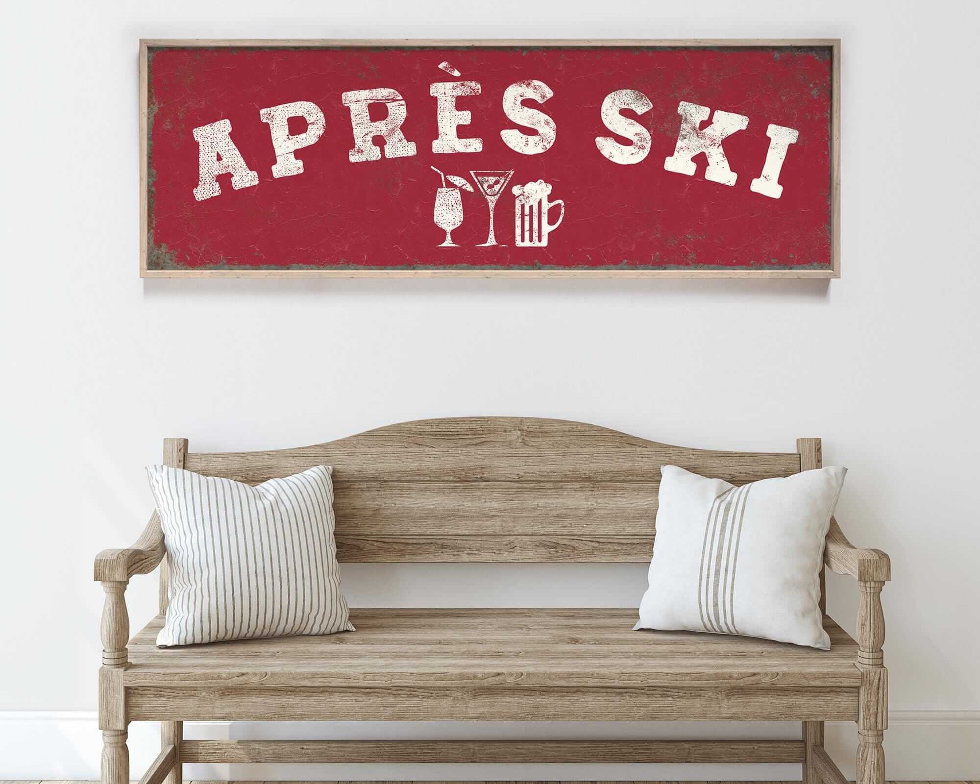 a wooden bench with two pillows, and above it is a red sign with the text "APRÈS SKI" in white letters.