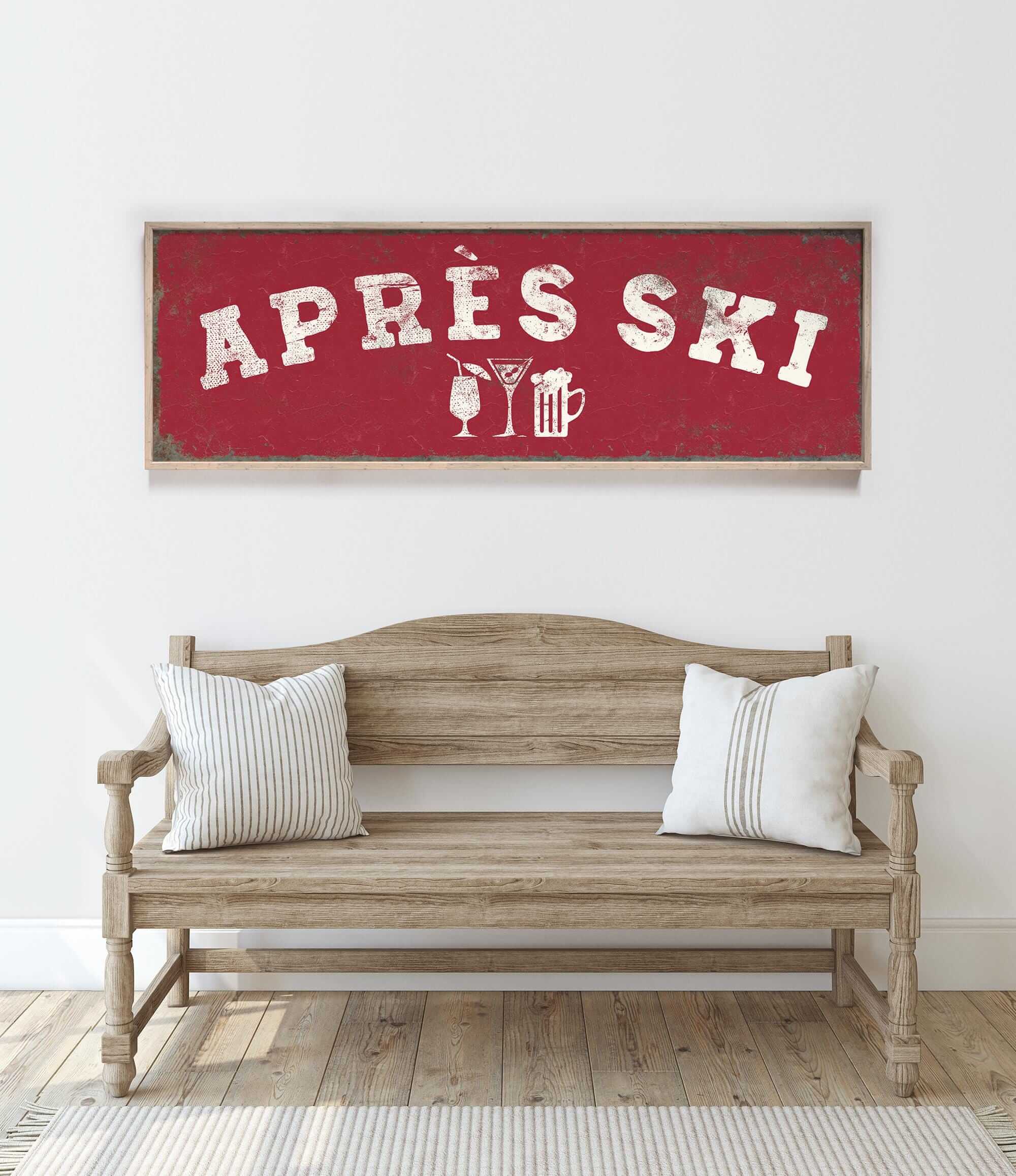 a wooden bench with two pillows, and above it is a red sign with the text "APRÈS SKI" in white letters.