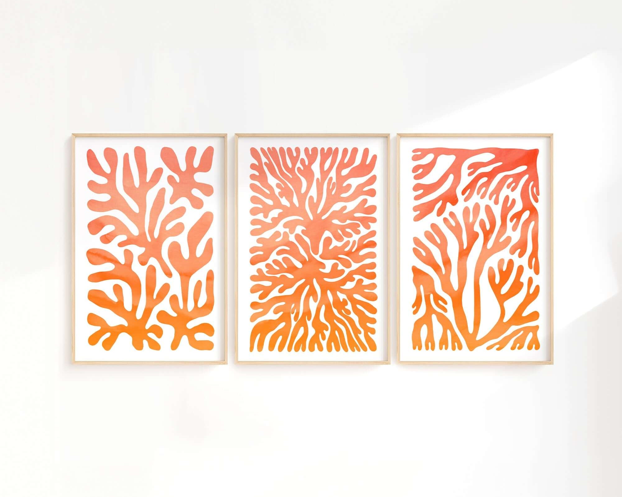 The Ocean Blocks Triptych | Set of Three Prints | 321 features abstract orange coral designs framed side by side, bringing vibrant charm and modern style to any home decor.