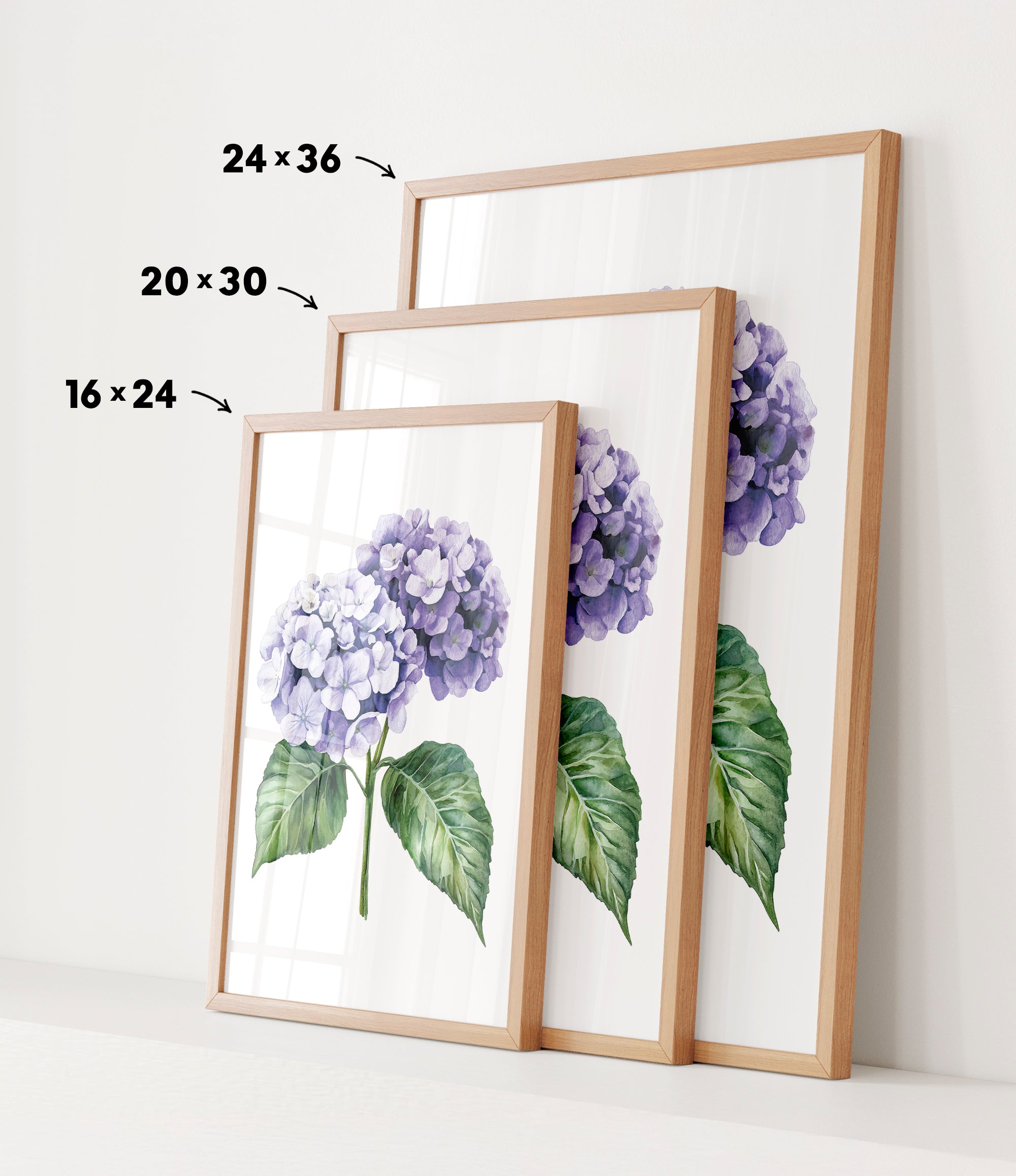 three framed prints of a purple hydrangea flower, each with a different size and frame.