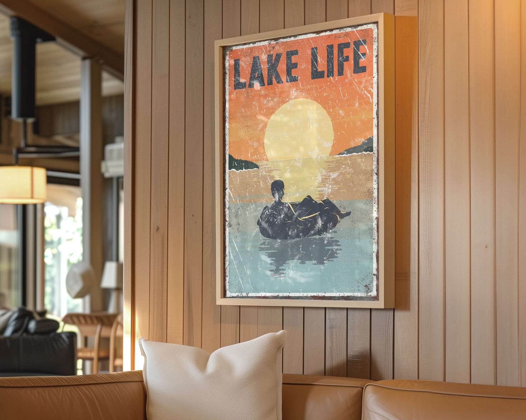 a living room with a couch and a painting on the wall