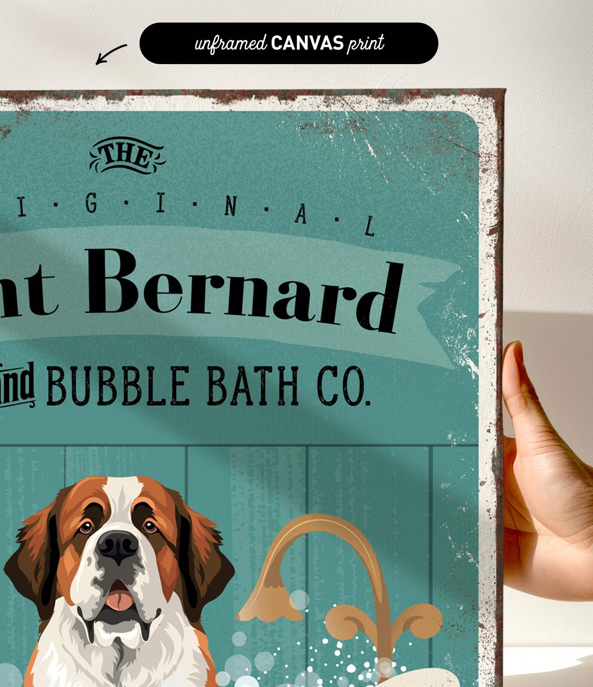 a hand holding a framed print with a dog illustration on it.