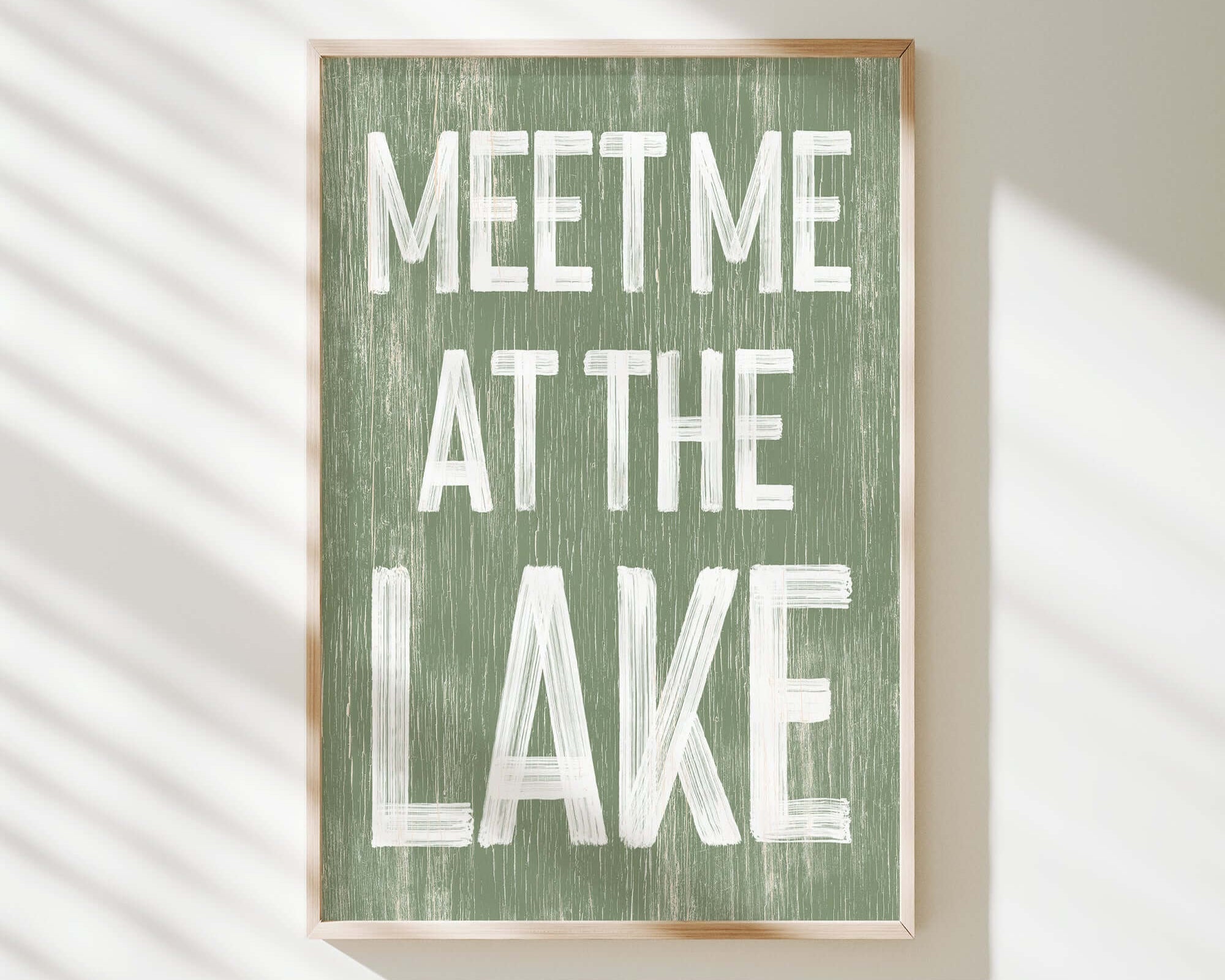 a sign that says meet me at the lake