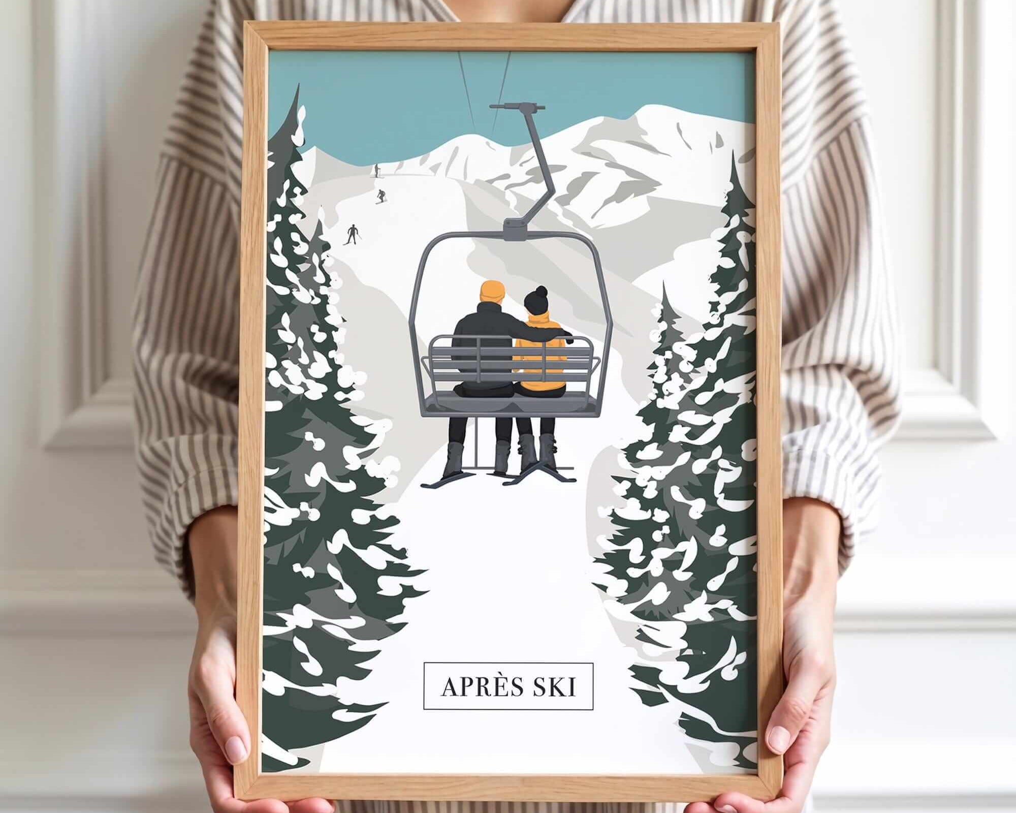 A person is holding a framed picture of a couple on a ski lift, surrounded by snow-covered trees, with the word "APRÈS" visible.