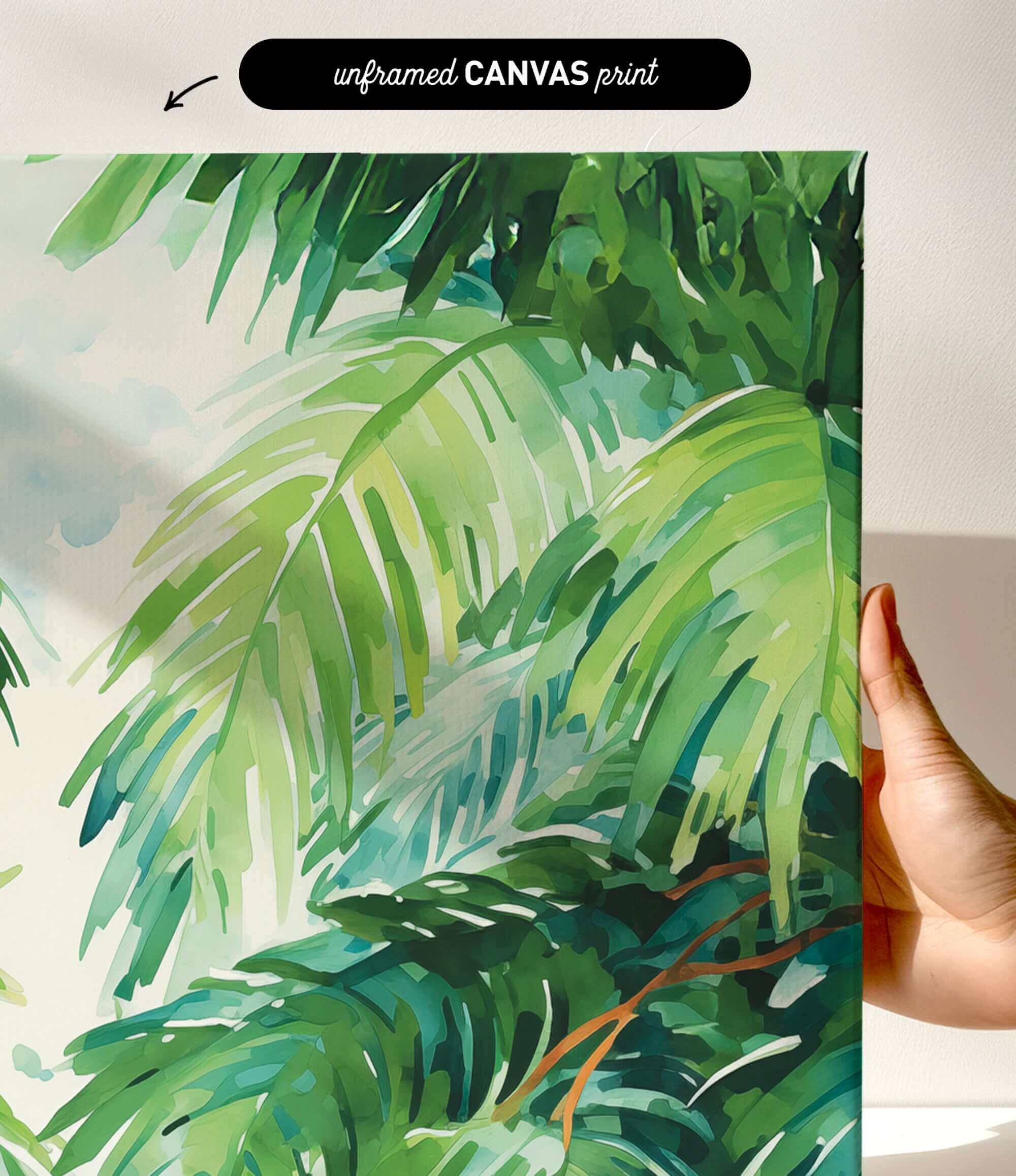 a close-up view of a vibrant, lush tropical plant with large, green leaves. The plant appears to be a type of palm or fern, with intricate patterns and textures. The background is a light green color, providing a contrast to the vivid foliage. The image is described as an "unframed canvas print" and "a hand holding it", suggesting that it is a printed artwork being held by someone.