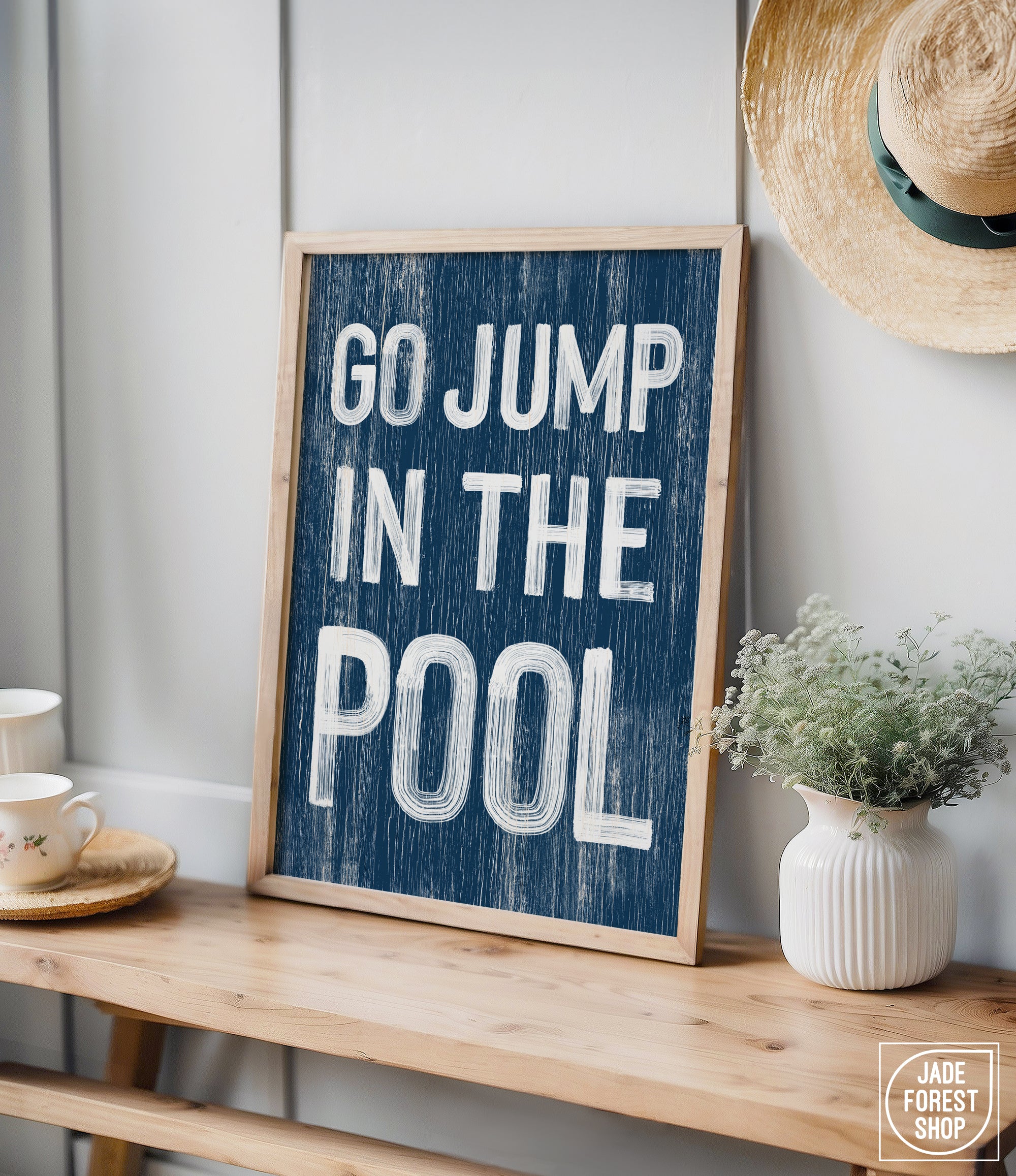 a sign that says go jump in the pool