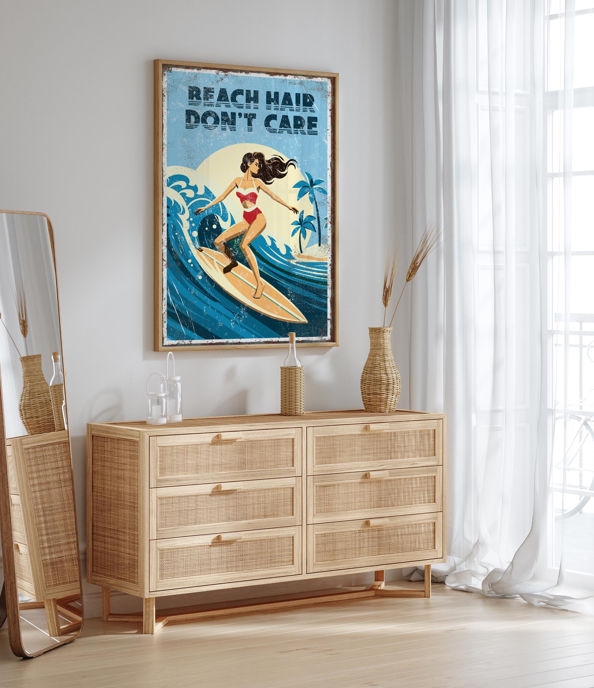 a framed poster of a woman surfing with the text "REACH HAIR DON'T CARE" on it, hanging on a wall above a wooden dresser.