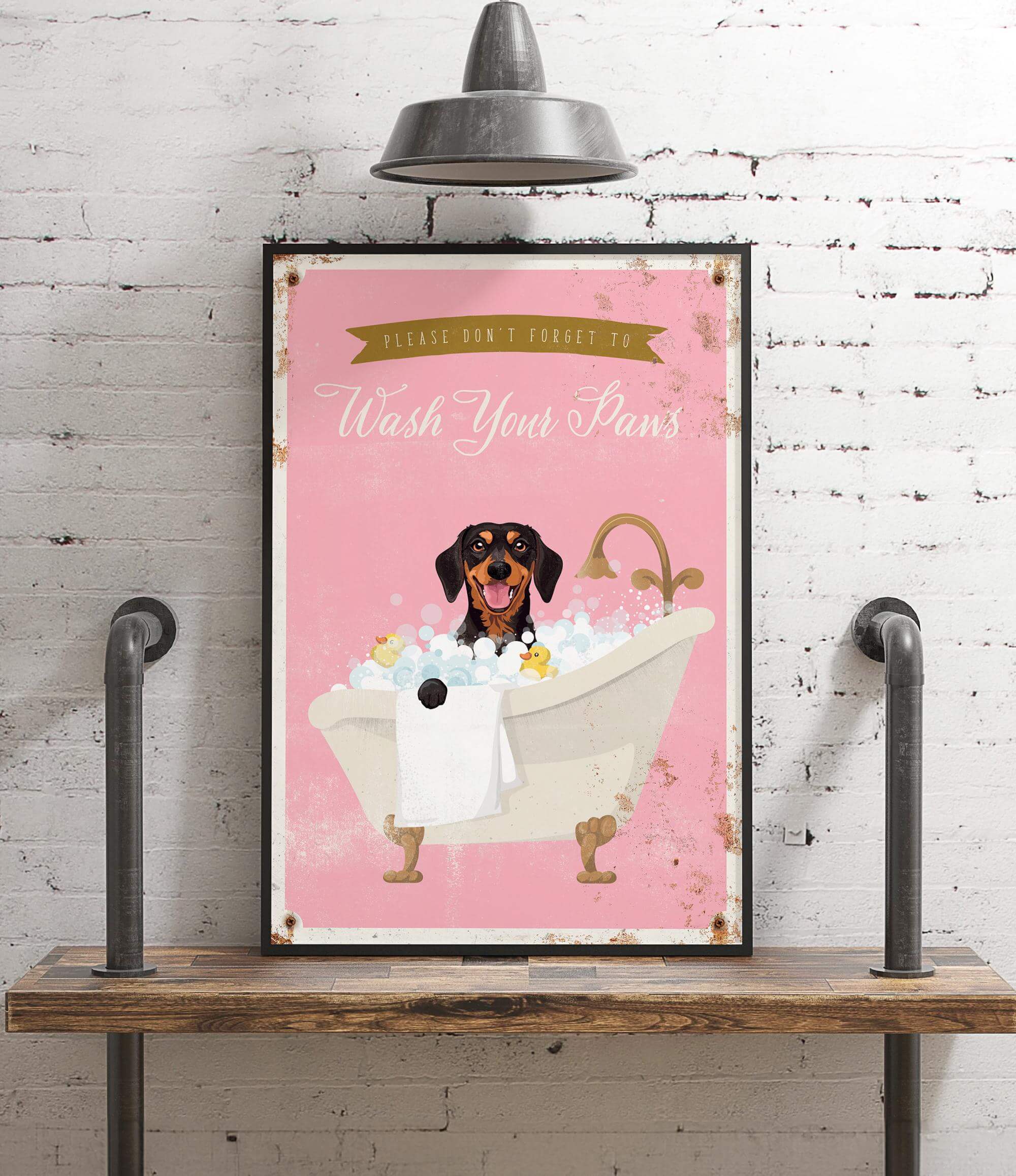 A framed poster with a dog sitting in a bathtub filled with bubbles, accompanied by the text "Please don't forget to wash your paws".